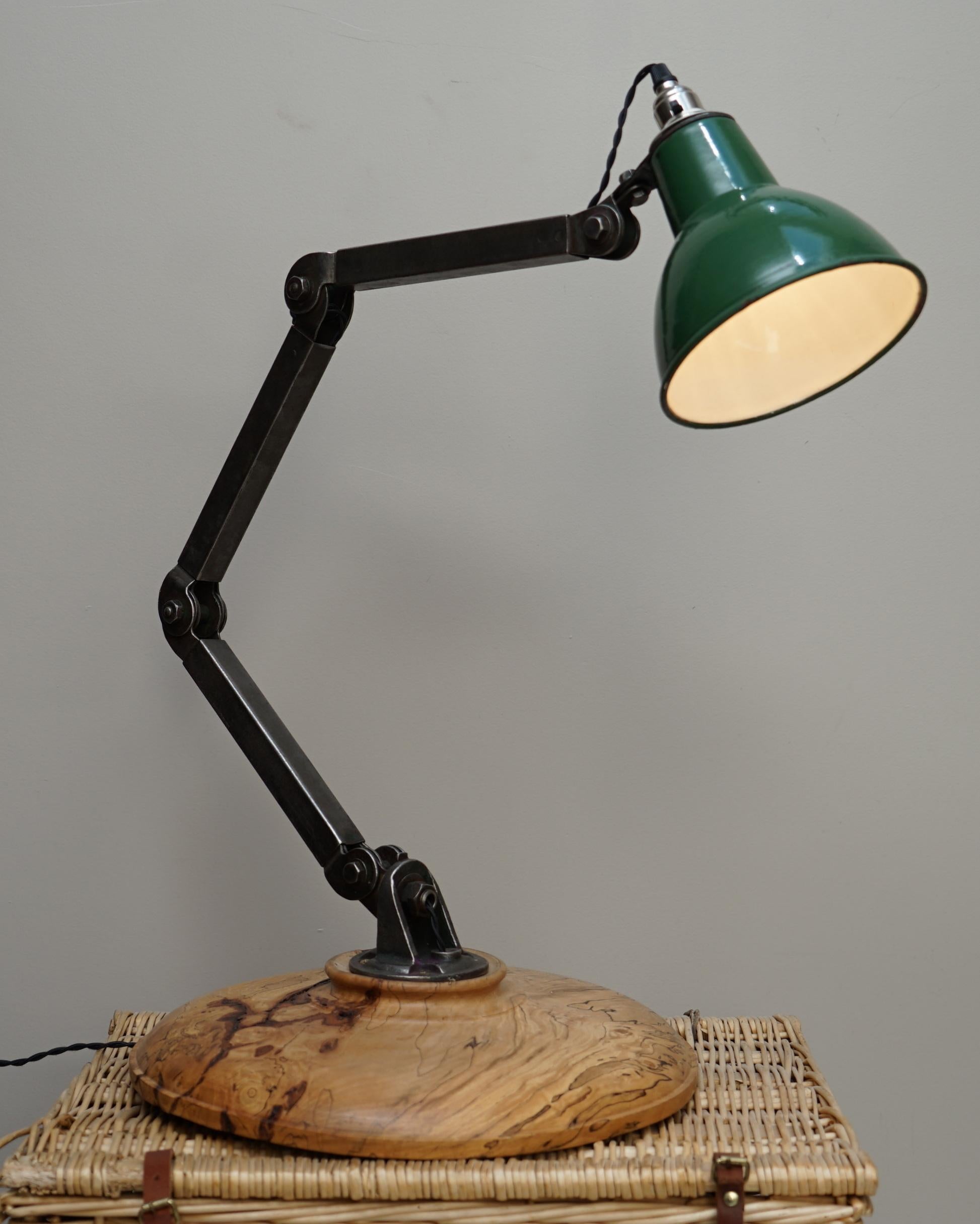 Wimbledon-Furniture

Wimbledon-Furniture is delighted to offer for sale this lovely vintage industrial steel four point articulation table lamp with over sized huge burr walnut base

A very good looking and well made piece, the base is massive