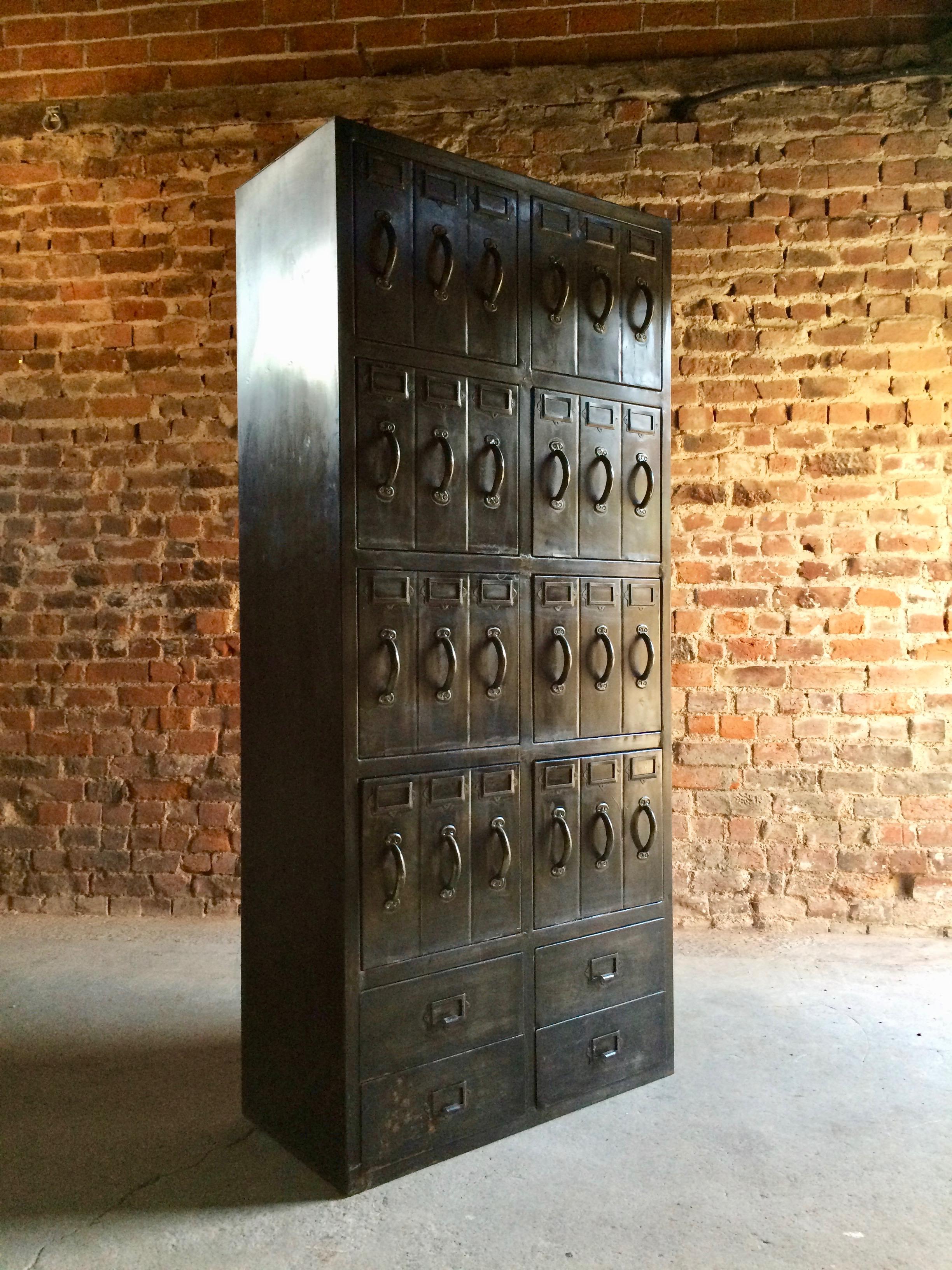 'As Good As It Gets' stunning bank of industrial steel lockers

A breathtakingly beautiful set of industrial banks of steel lockers of exceptional quality and style with eight drop down compartments each with three pull handles and index card