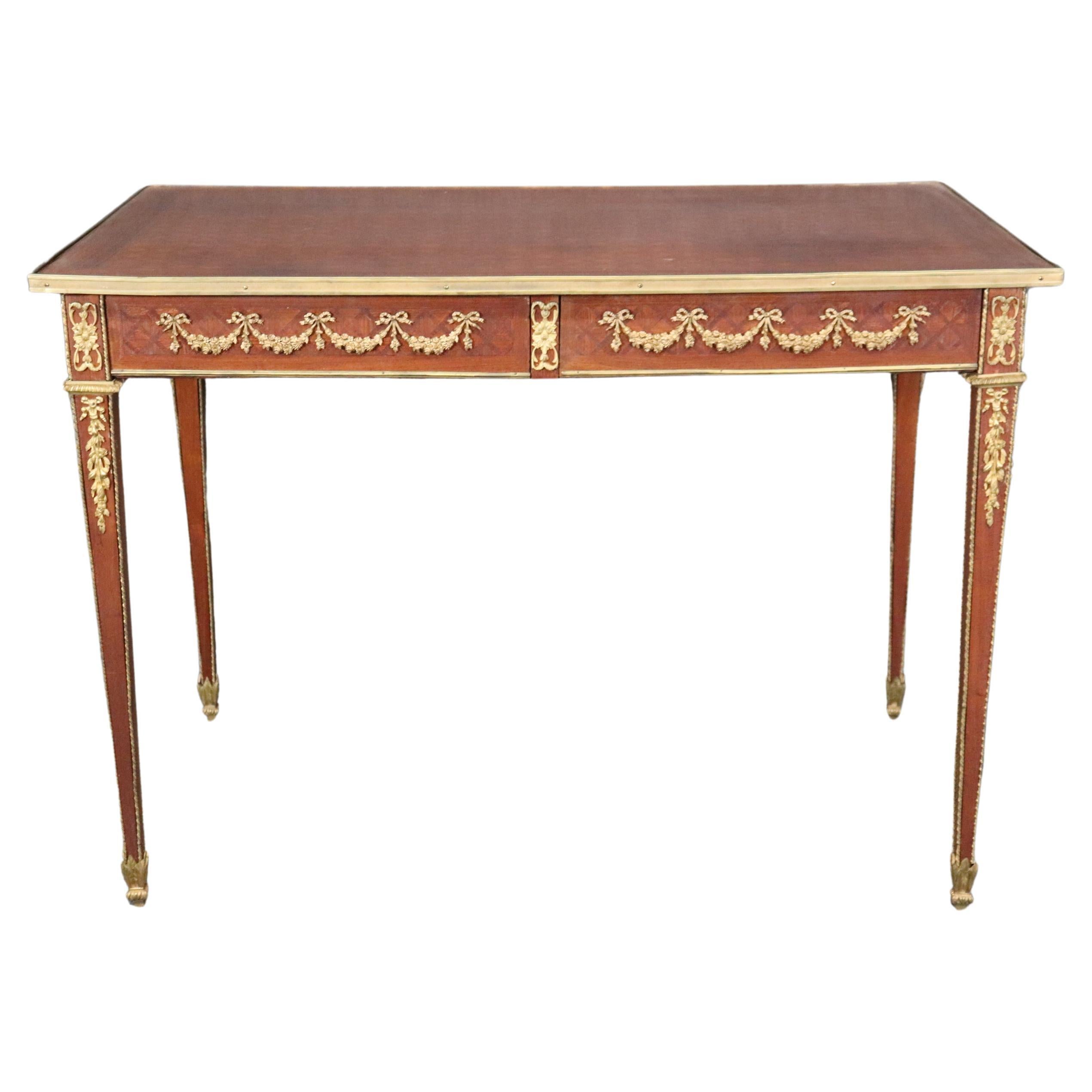 Superbe bureau français Directoire en marqueterie d'acajou monté sur bronze  en vente