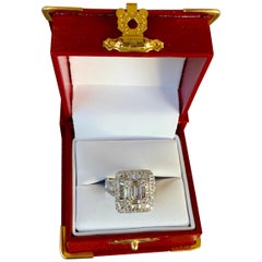 Stunning Invisibly Set Baguette and Round Diamond 18 Karat White Gold Ring