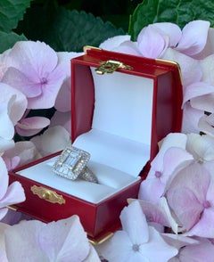 Stunning Invisibly Set Baguette and Round Diamond 18 Karat White Gold Ring