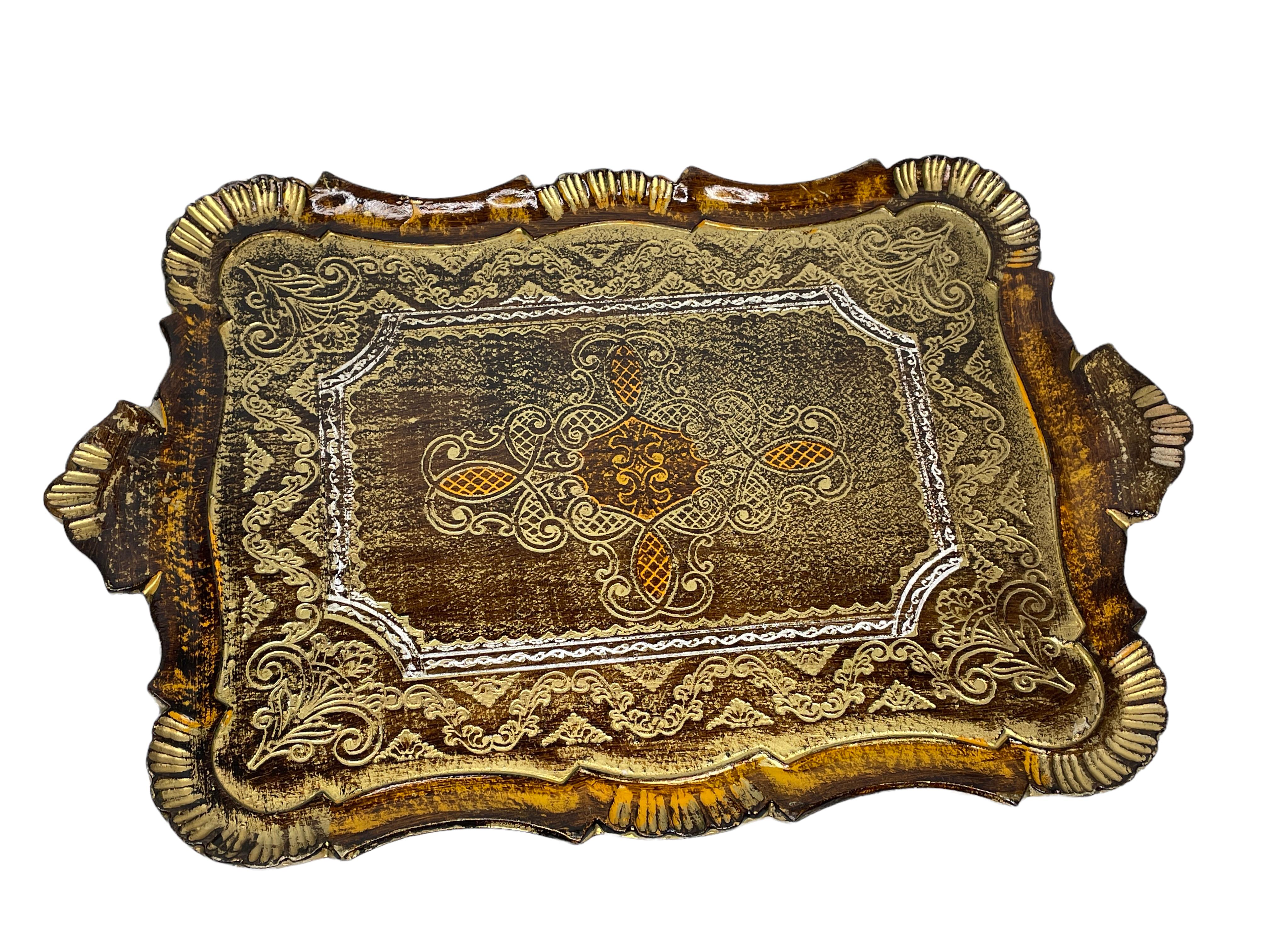 Offered is an absolutely stunning, 1960s Italian giltwood serving tray. Minor patina and paint lost gives this piece a classy statement. A nice addition to any table or room.