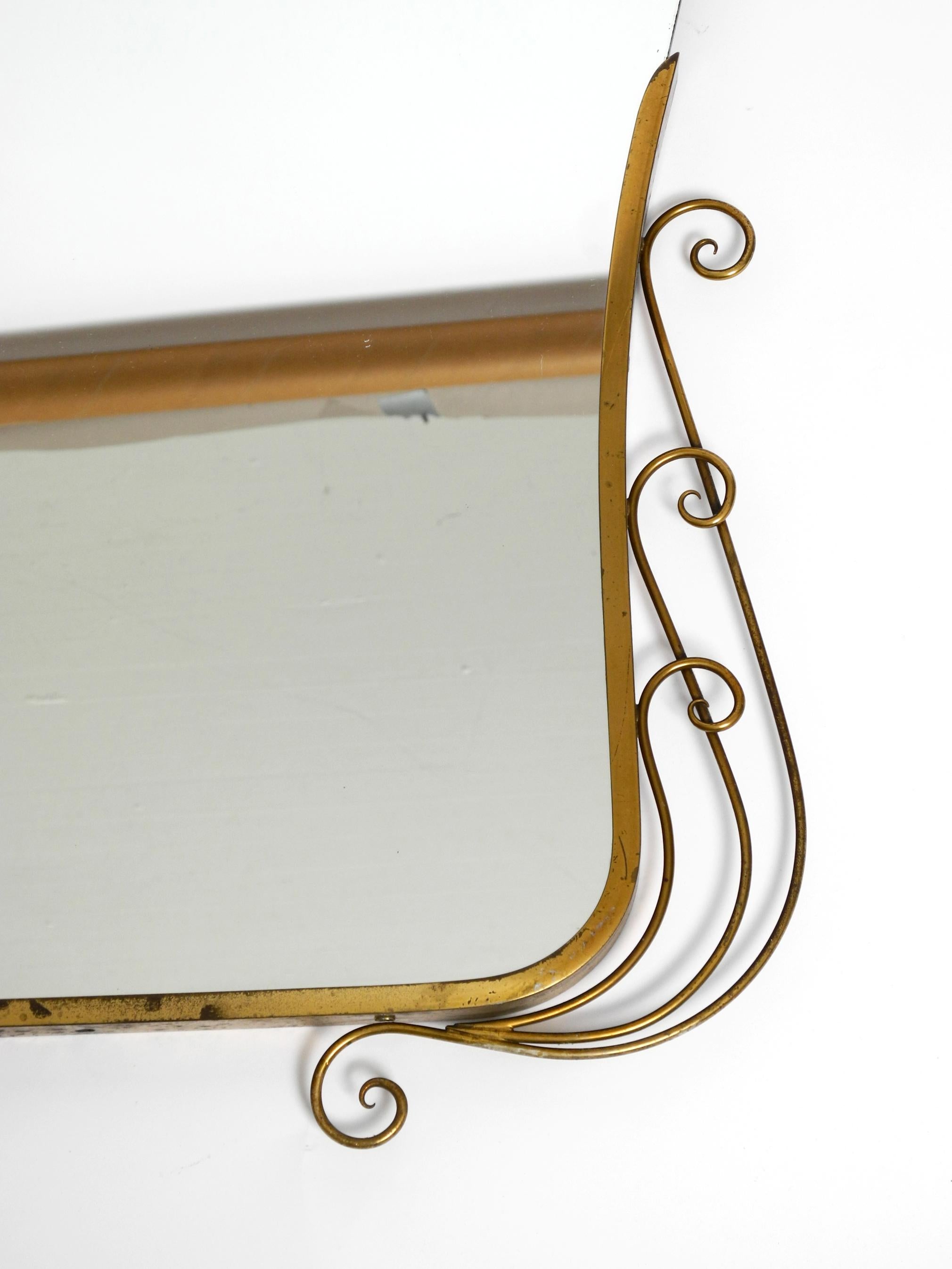 Stunning Italian Mid Century Wall Mirror with an Ornate Brass Frame 8