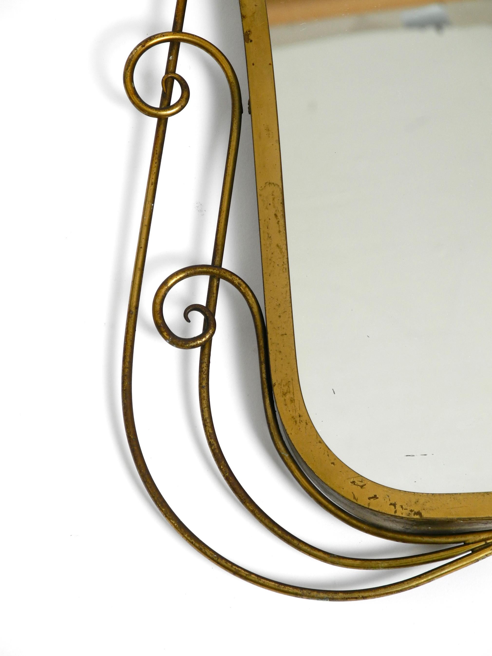 Stunning Italian Mid Century Wall Mirror with an Ornate Brass Frame 10