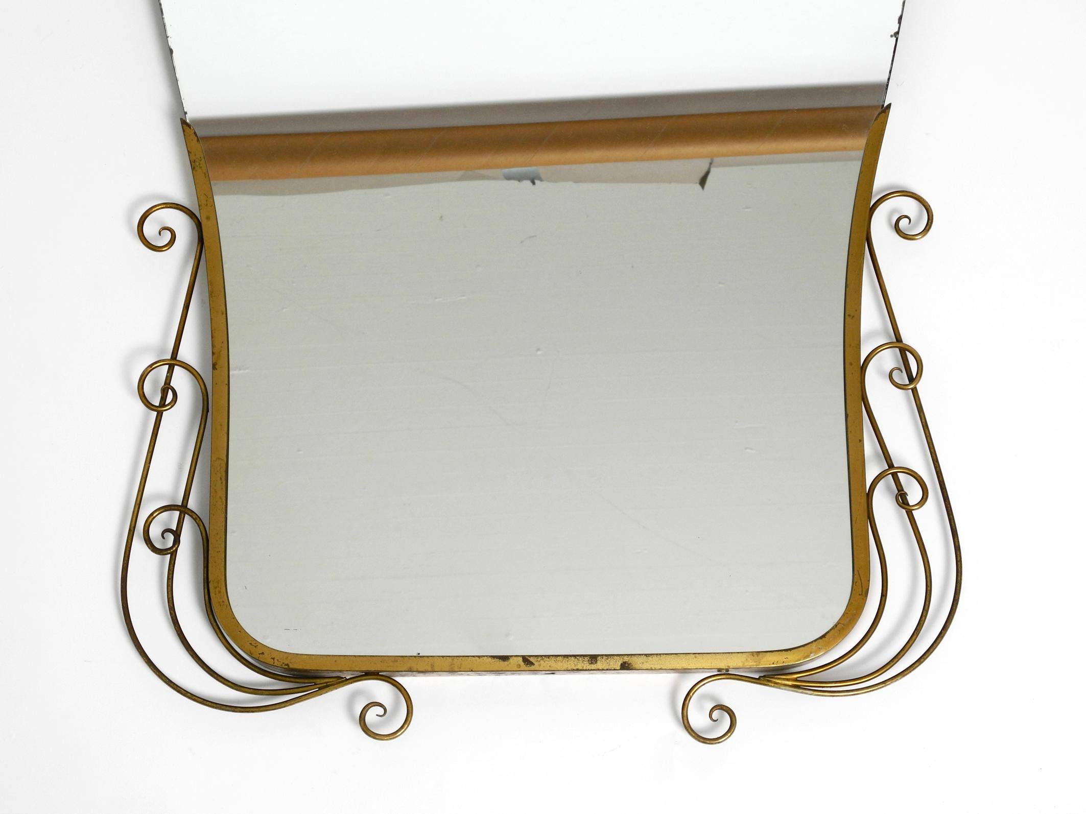 Stunning Italian Mid Century Wall Mirror with an Ornate Brass Frame 1
