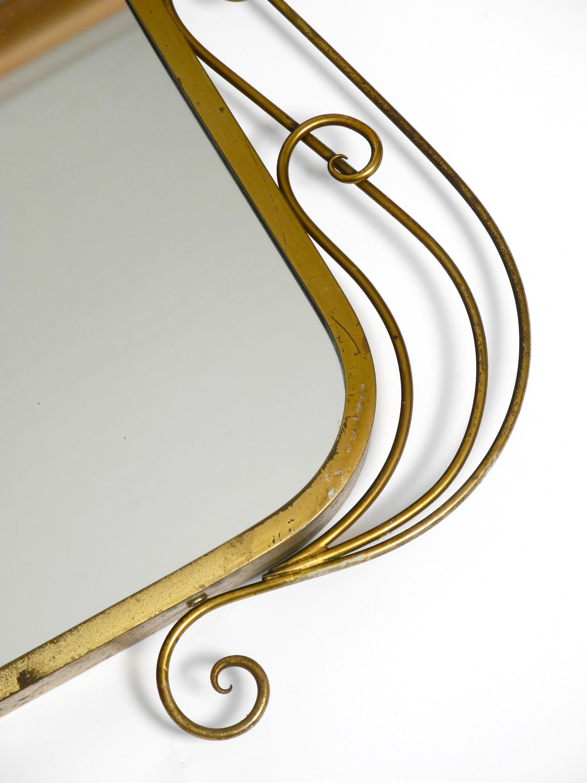 Stunning Italian Mid Century Wall Mirror with an Ornate Brass Frame 3