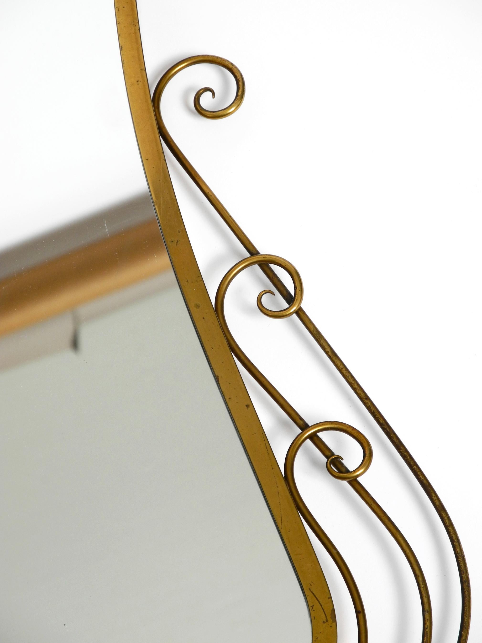 Stunning Italian Mid Century Wall Mirror with an Ornate Brass Frame 4