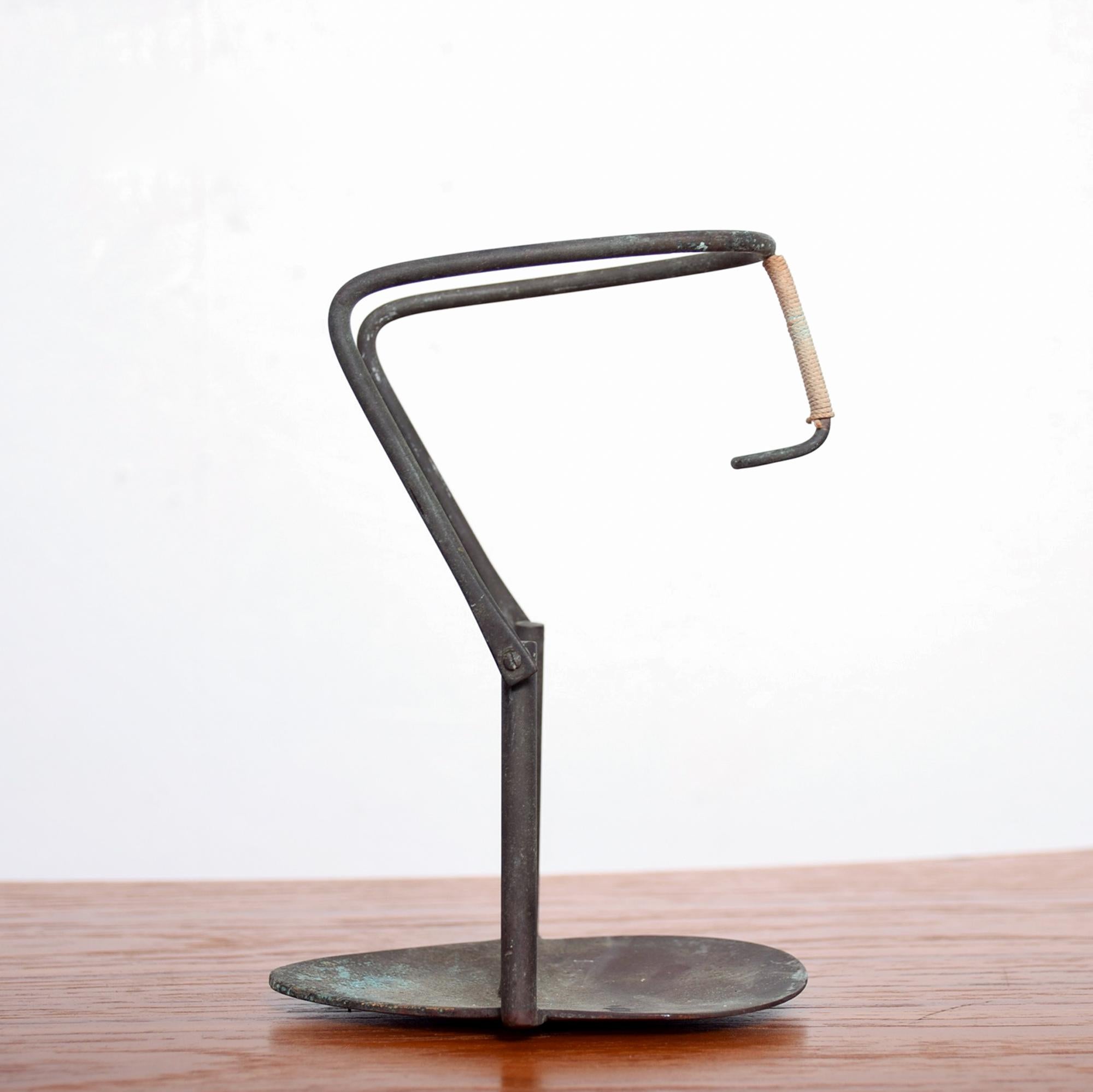 Stunning Brutalist bronze candleholder with rope covered handle. Aged bronze in the manner of Jack Boyd Mid-Century Modernist artist from San Diego, 1960s.
Piece is unmarked. Simply amazing quality.
Measures: 7