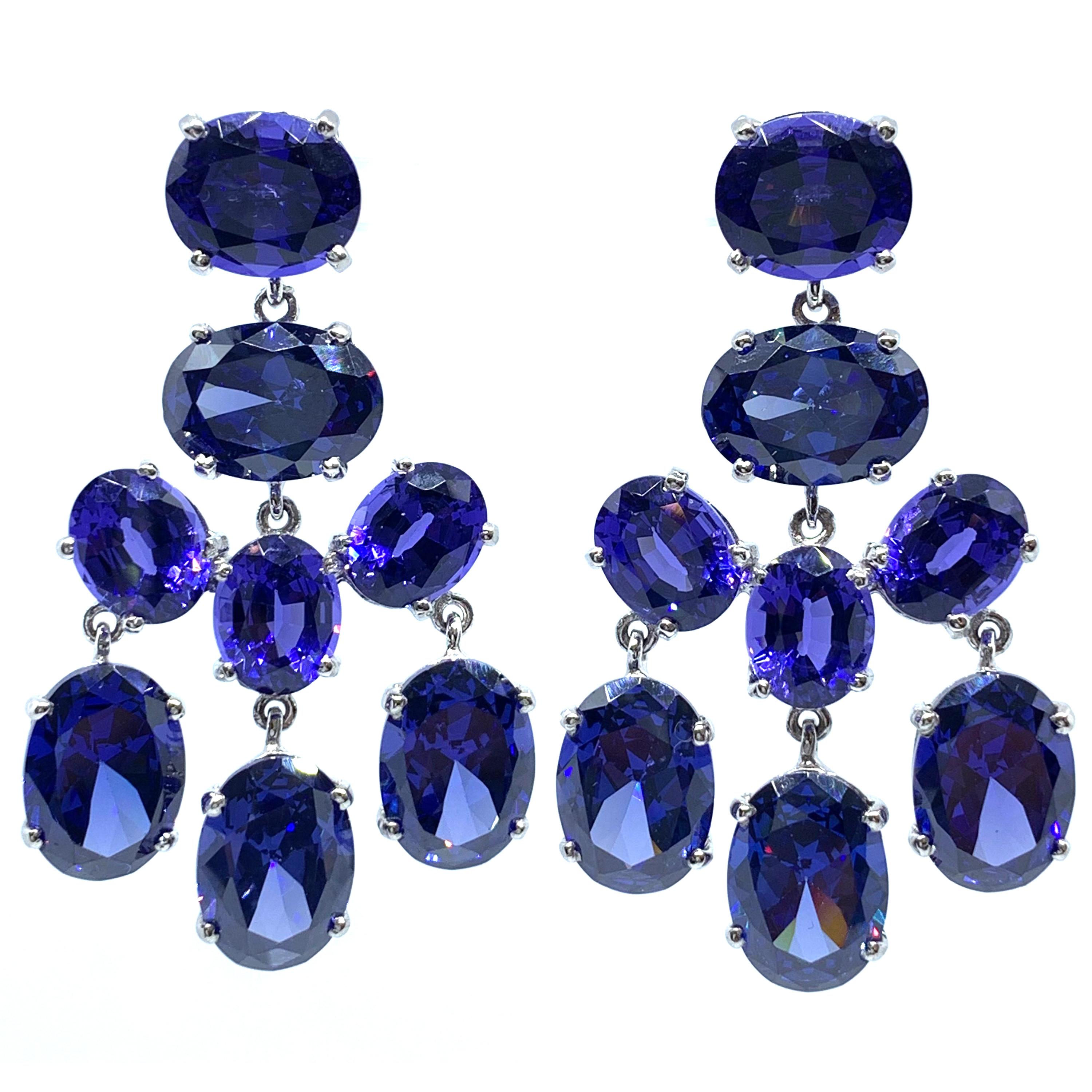Show stopper! Jarin Lab-Sapphire and Tanzanite Chandelier Earrings

These stunning pair of chandelier earrings feature 16 pieces of oval lab-created sapphires and tanzanites. The stones are top quality, multi faceted, and highly reflective with rich