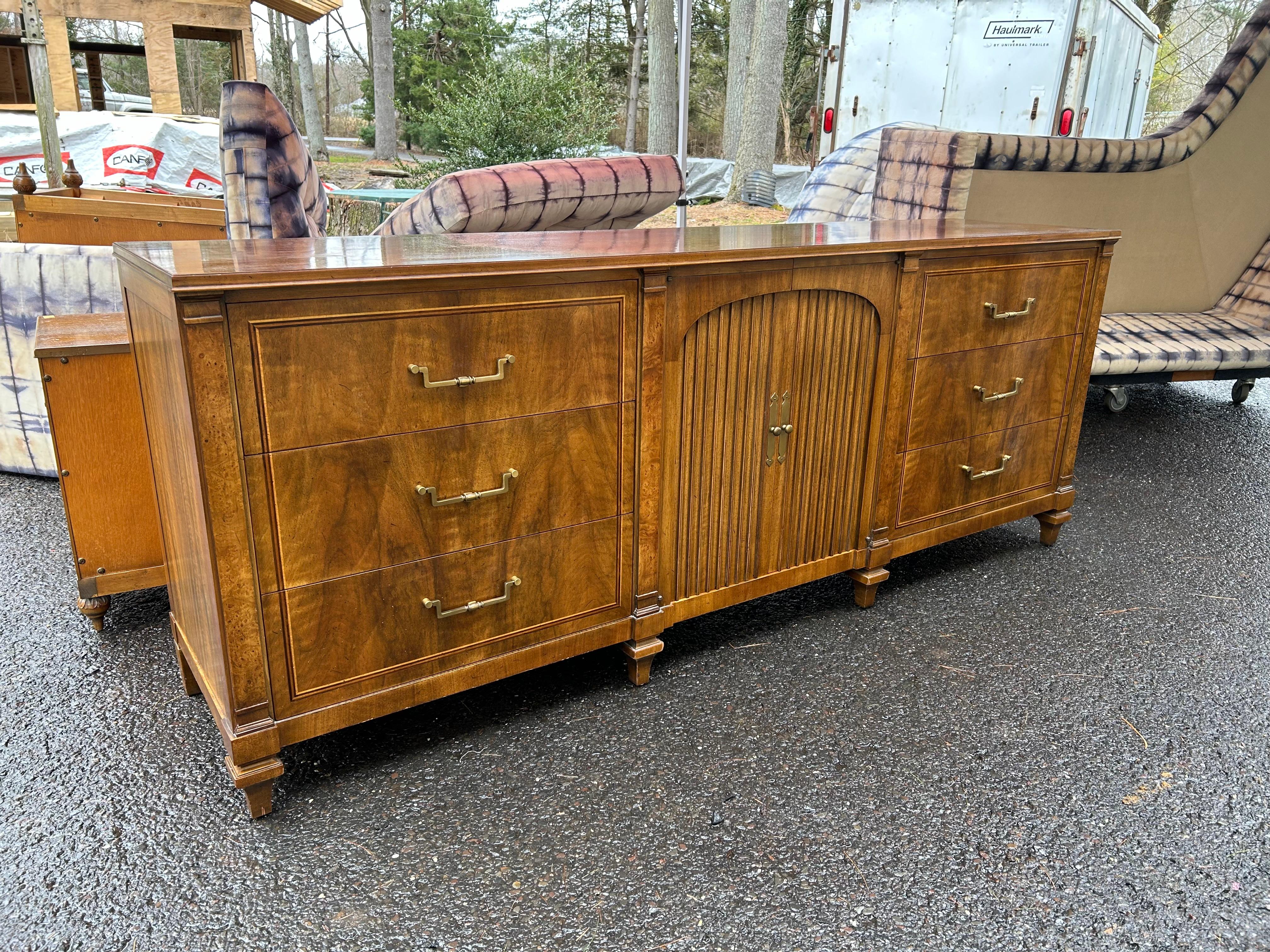 A gorgeous French Regency Louis XVI style credenza by John Widdicomb, circa 1960s.
We love the ‘Mob Wife’ Aesthetic vibe this piece gives-so vintage chic.  This piece has a commanding stature and measures 33