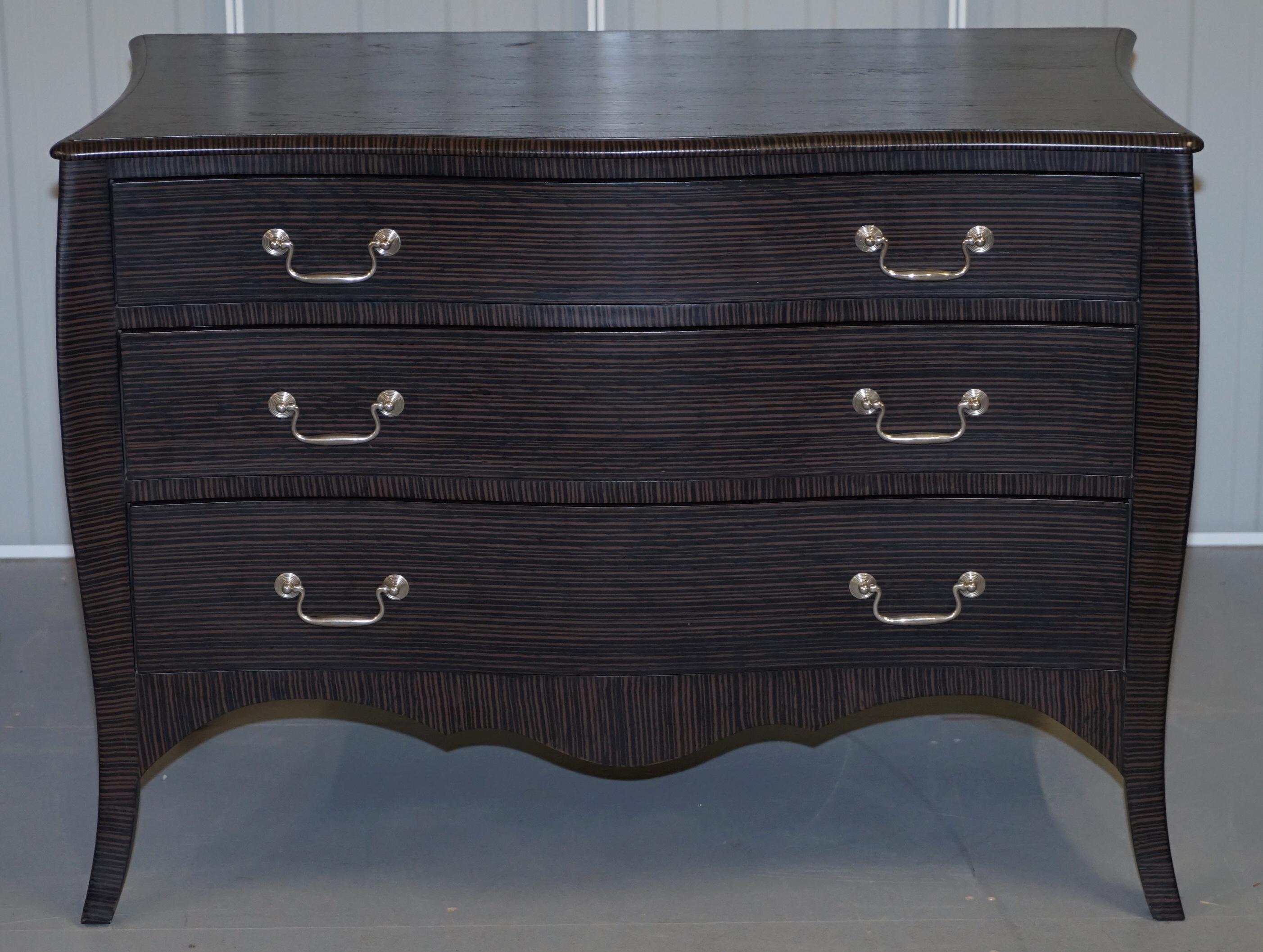 We are delighted to offer for sale this lovely RRP £2699 Julian Chichester chest of drawers 

A good looking well made and decorative piece, they have a nice serpentine front, the frame is oak with a striped black and brown finish which looks very