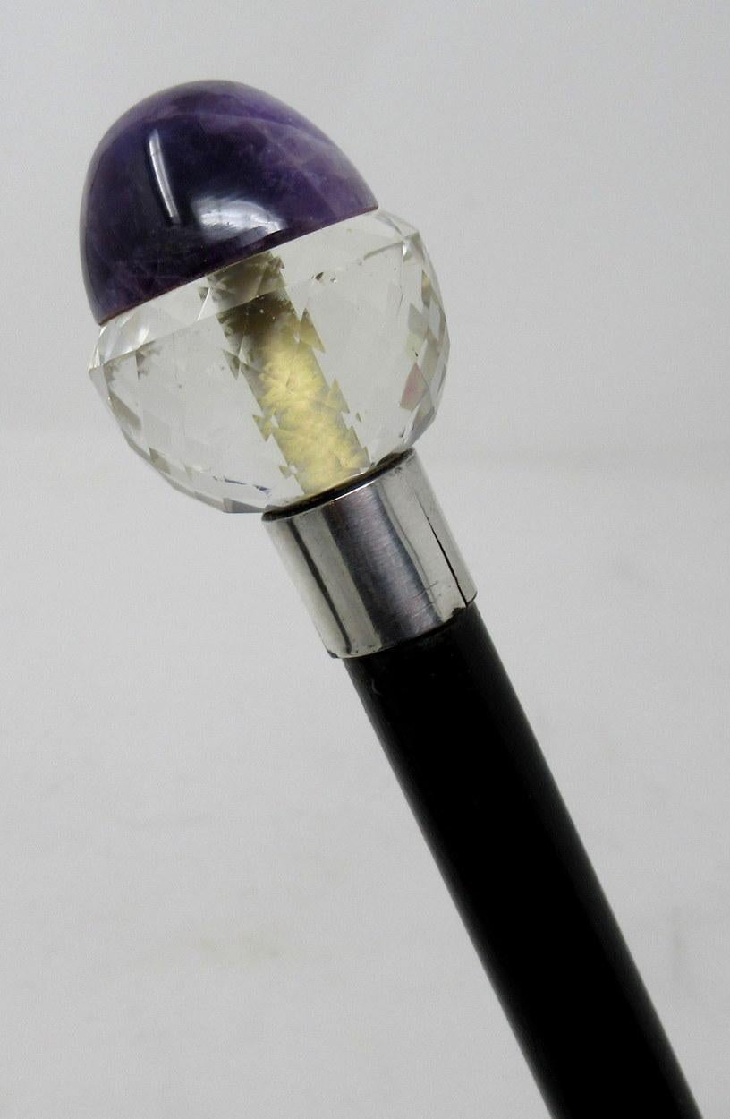 Stunning rare ebonized ebony walking cane with highly decorative hand cut crystal and amethyst grip modelled as an acorn with white metal collar, of outstanding quality, made during the last quarter of the 19th century.

The decorative knopped