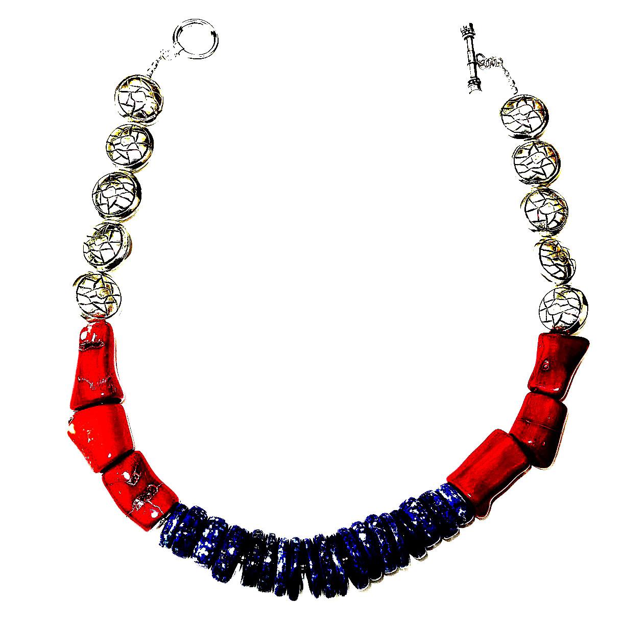 Here's our patriotic necklace in red, white, and blue!  This handmade necklace of discs of blue lapis lazuli, red bamboo coral, and silver tone etched discs is secured with a Sterling Silver toggle. This unique necklace has vibrant colors and