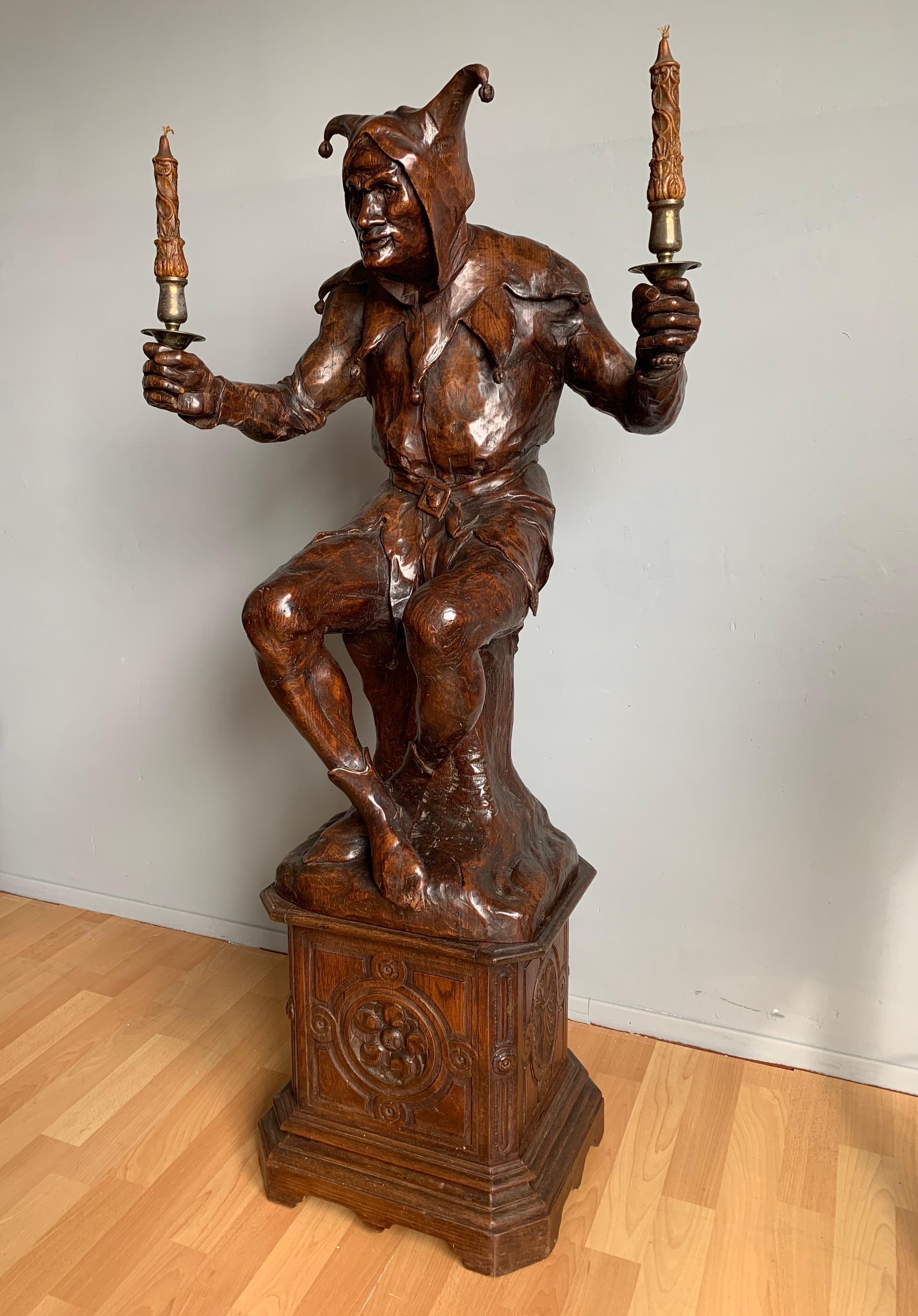 Marvelous antique French jester sculpture.

This large and amazing sculpture of a sitting court jester in the Renaissance Style truly is a rare find. The incredible details in the clothes, his facial features and his perfect body posture tell us