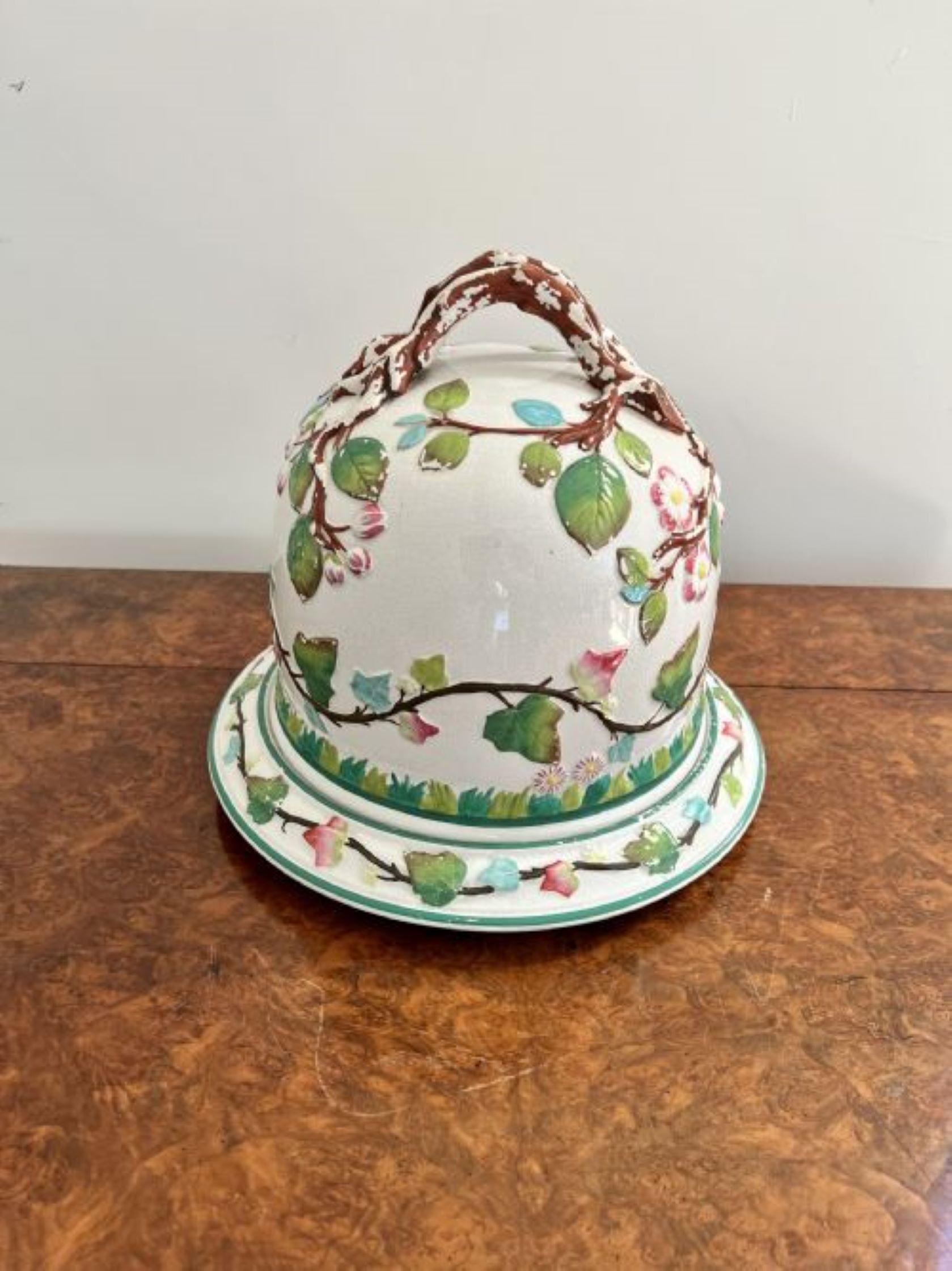 Stunning large antique quality Majolica cheese dish having a large quality dome shaped lift off top with a shaped handle decorated with flowers and leaves in wonderful green, pink, brown and blue colours on a circular base