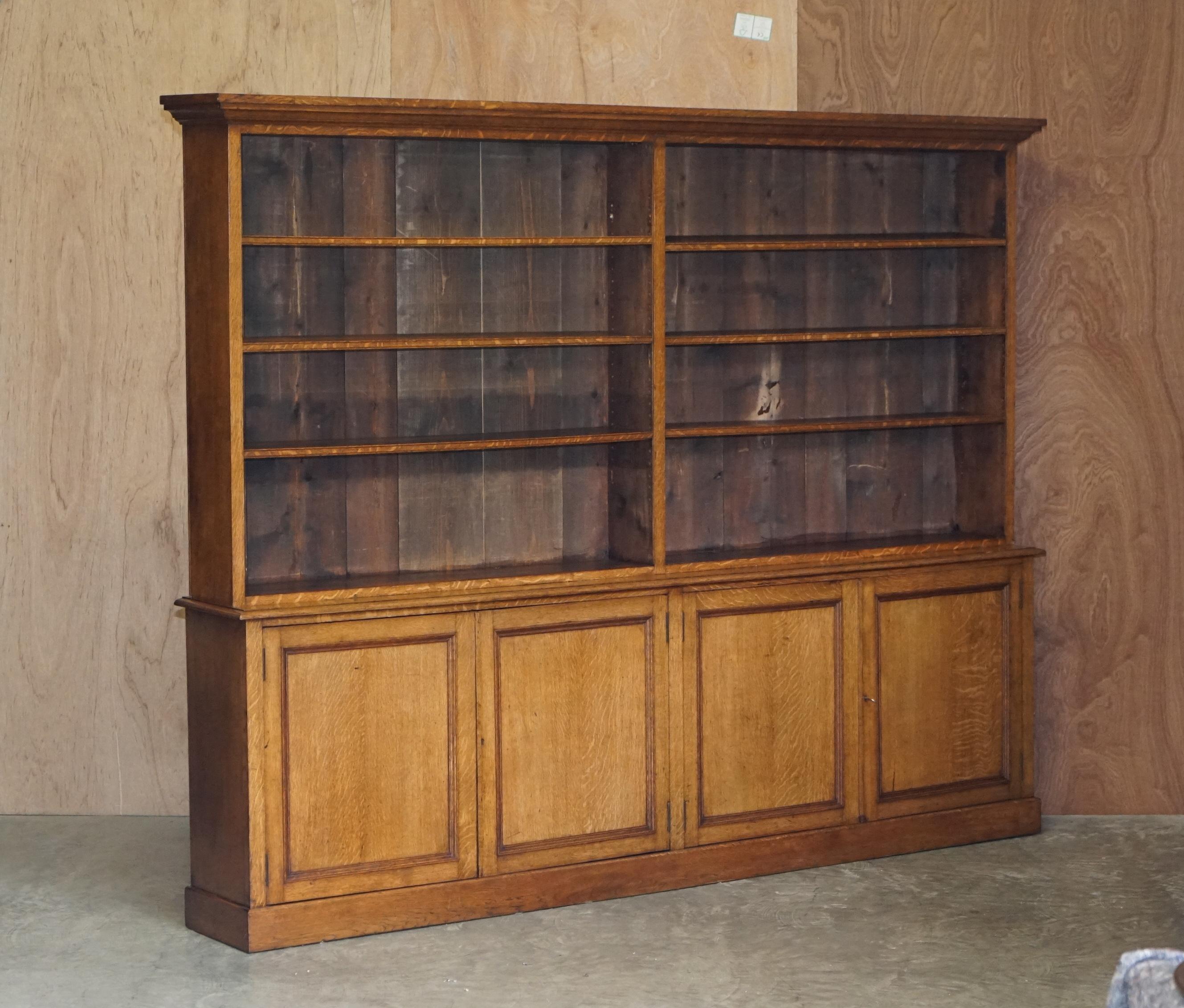 We are delighted to offer for sale this stunning hand made in England oak library bookcase with cupboard base and original key

A very good looking well made and decorative piece of Victorian town house furniture. This bookcase is English oak,