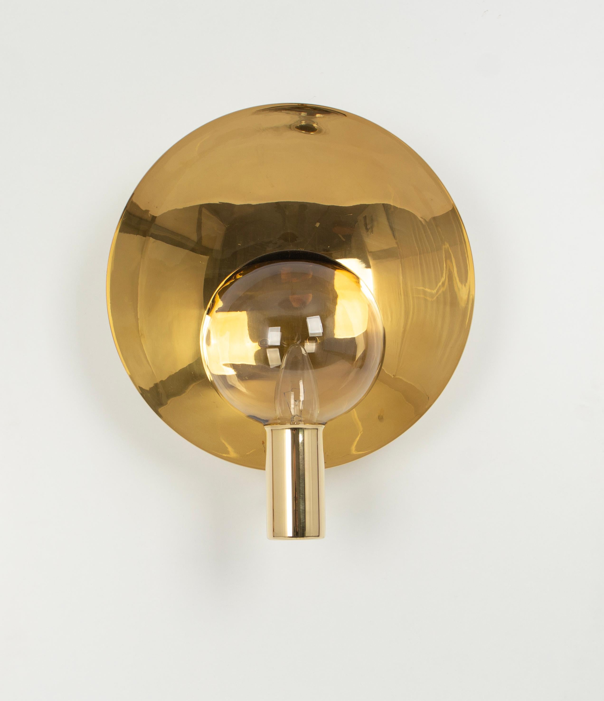 Stunning Large Brass and Smoke Glass Sconce, Hans Agne jakobsson, Sweden, 1970s
The sconce is composed of one smoked glass with a brass base.

High quality and in very good condition. Cleaned, well-wired, and ready to use. 
The sconce requires 1 x