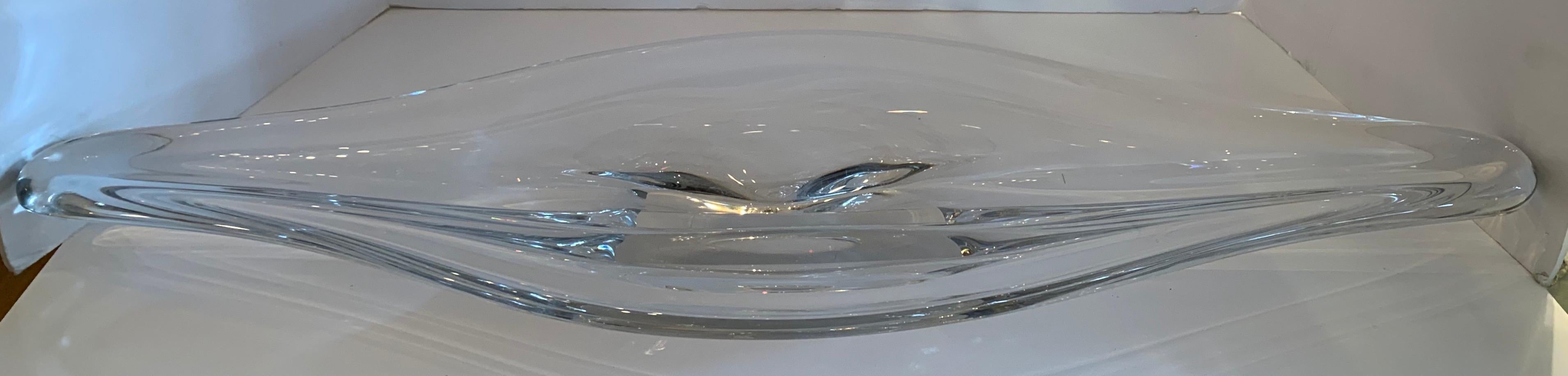 A stunning large Mid-Century Modern elongated centerpiece crystal bowl Val Saint Lambert lozenge shaped, Belgium, 1960s.
Etched Signature Val St Lambert On The Underside Of The Bowl
This incredible piece was designed by Rene Delvenne for Val Saint