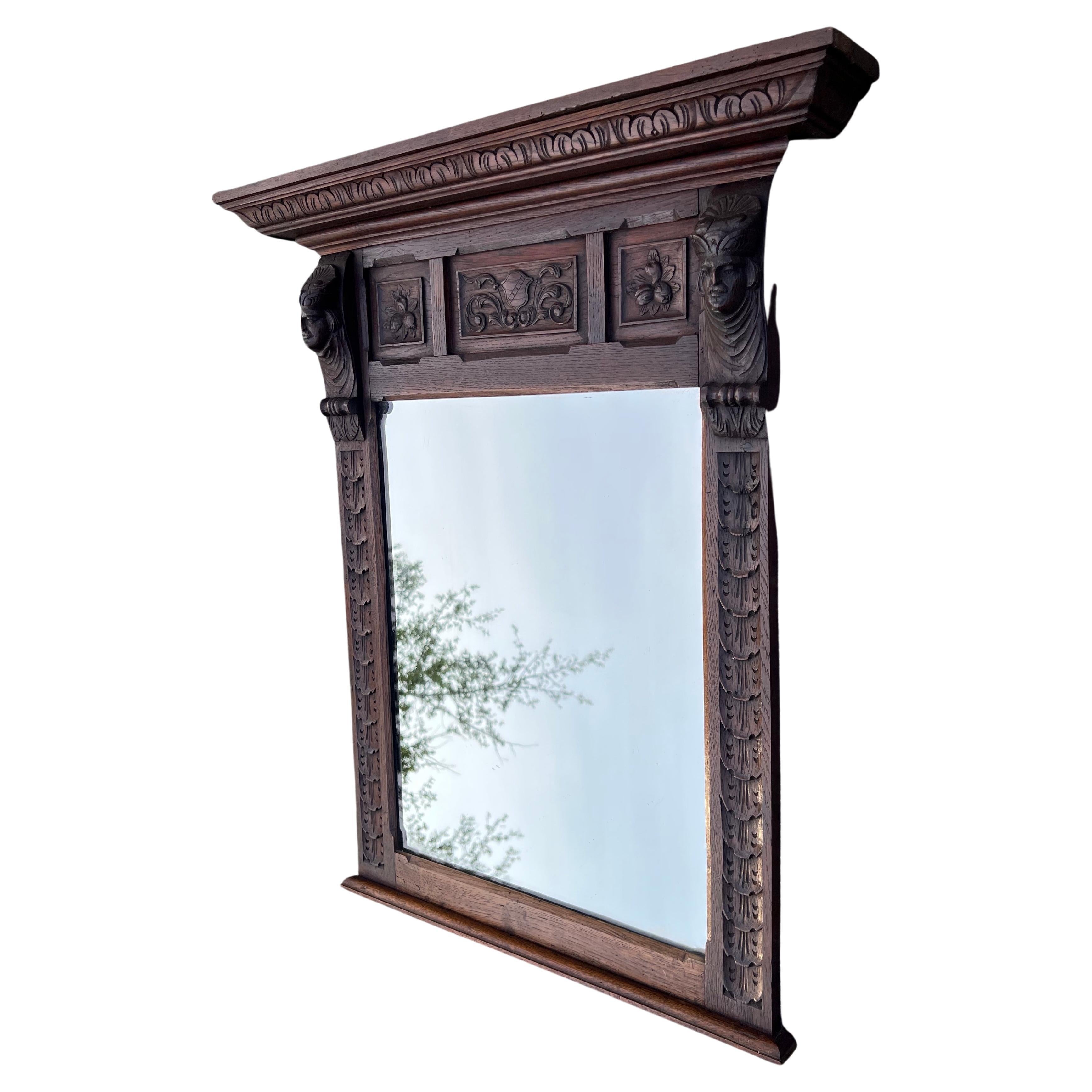 Striking large, Renaissance Revival wall mirror with an amazing patina.

If you are familiar with style elements of the Renaissance era then you will immedidately recognize this practical size antique as a Renaissance Revival piece. In this