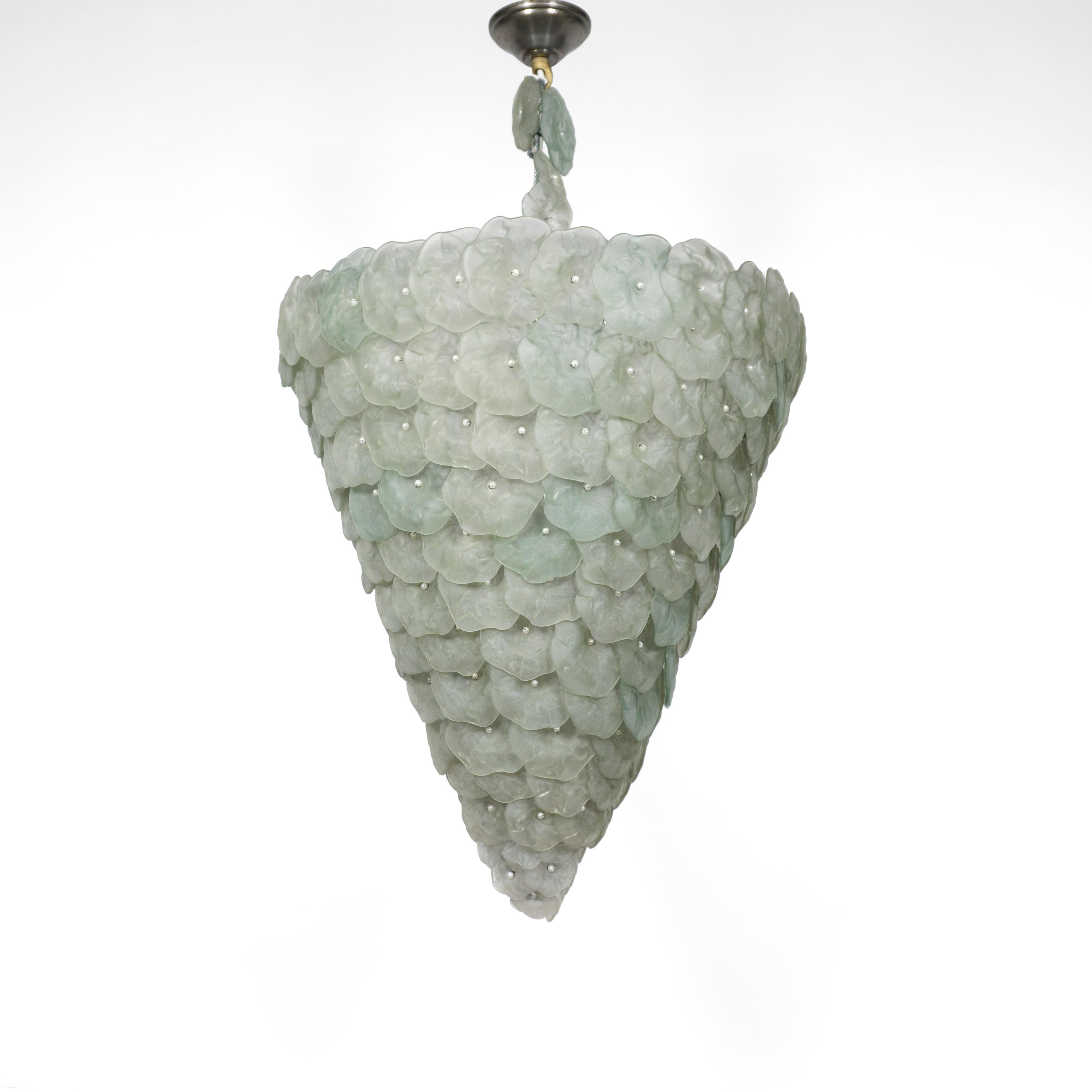Spectacular, large and rare Italian mid-century modern basket lamp chandelier made of dozens of Murano glass flowers. Each hand-blown pastel green flower is individually mounted on a metal frame and together the delicate glass flowers create a