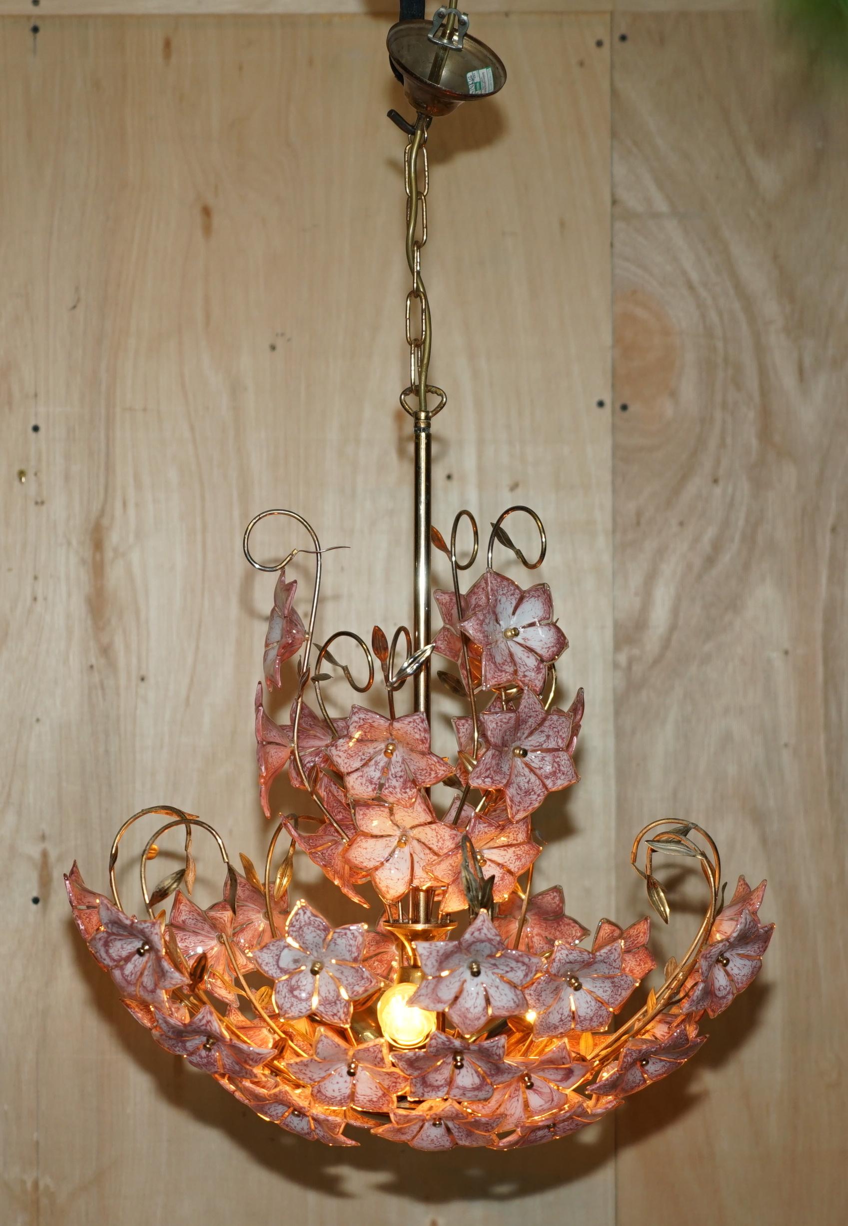 Royal House Antiques

Royal House Antiques is delighted to offer for sale this exquisite circa 1960's Italian Murano Rose glass Floral Celling Chandelier 

Please note the delivery fee listed is just a guide, it covers within the M25 only for the UK
