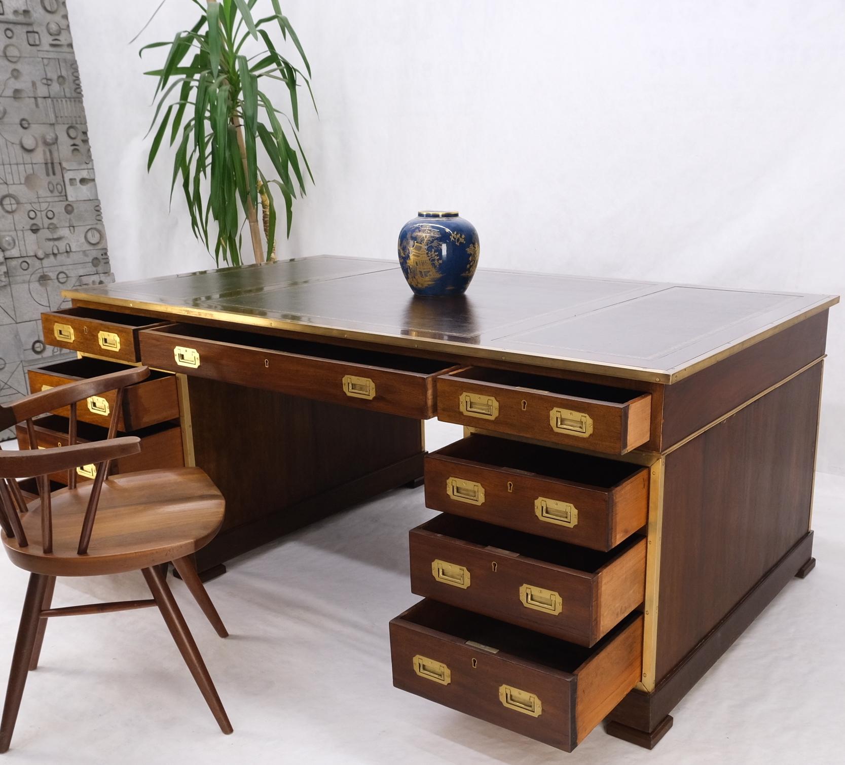 Stunning large oversize leather top two pedestal campaign partners desk table.