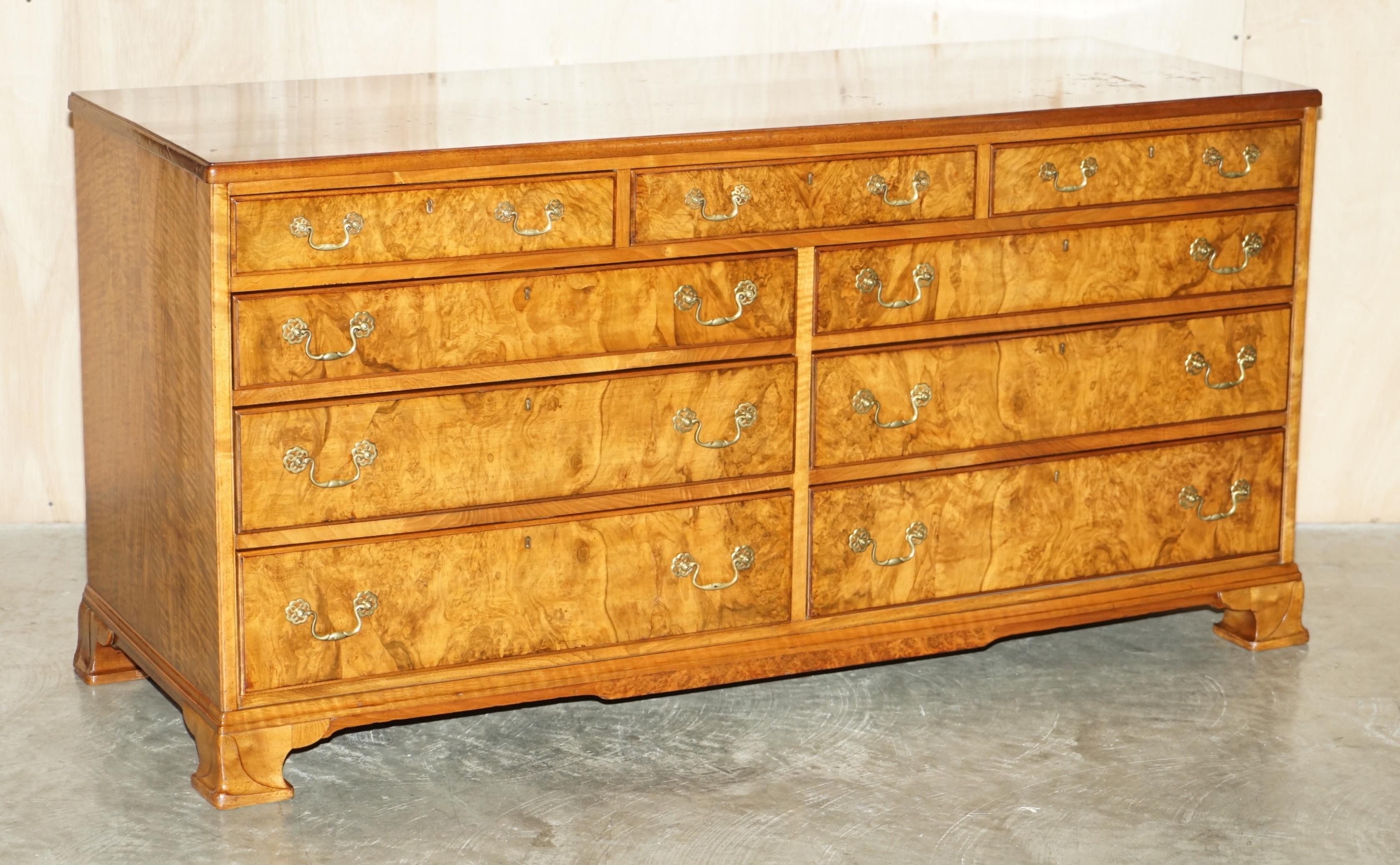 We are delighted to offer for sale this exquisite vintage quarter cut burr and burl walnut sideboard sized chest of drawers with stunning timber patina.

A very good looking and well made piece, this is basically art furniture, the grain of timber