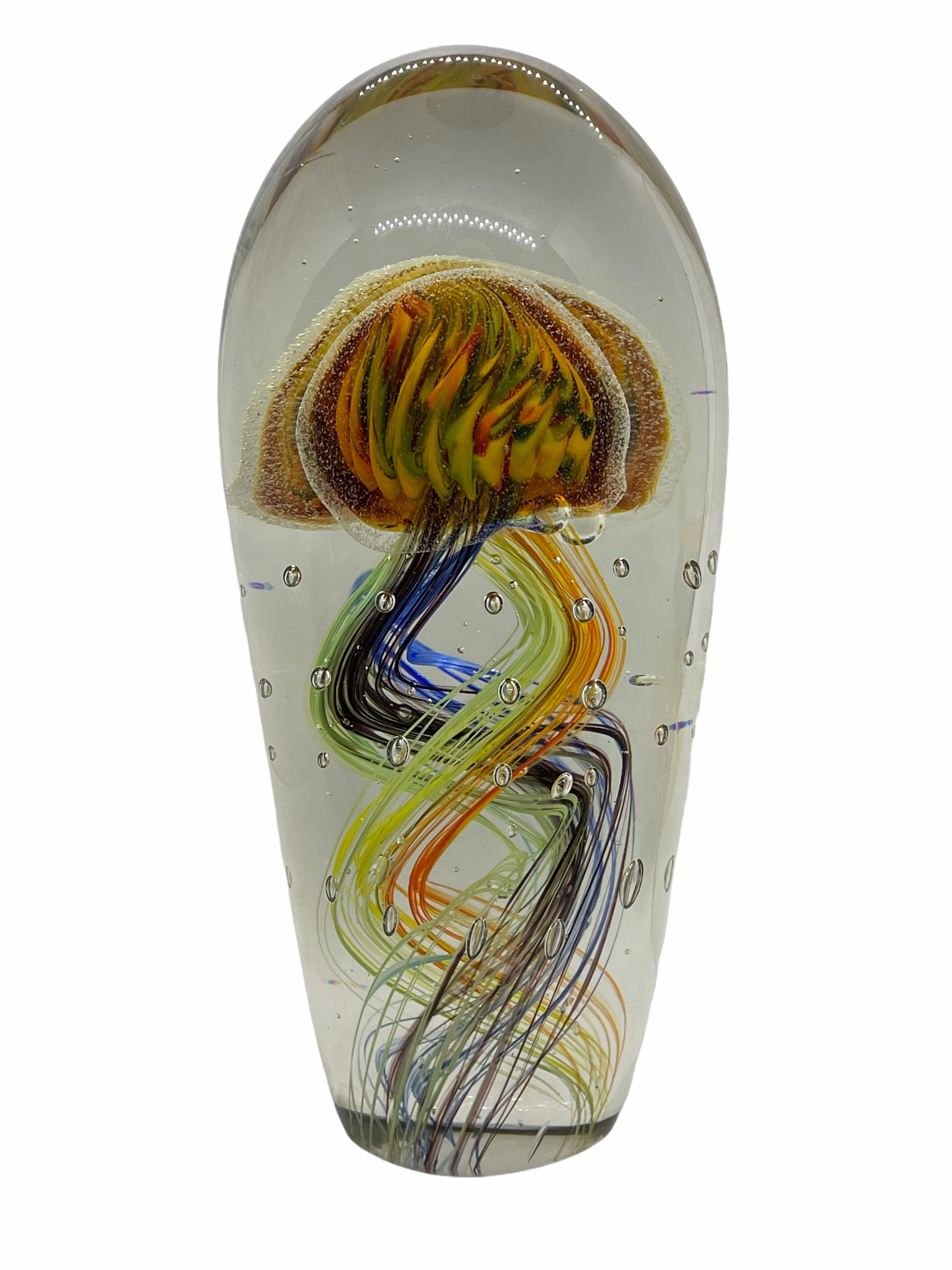 Beautiful stunning large Murano hand blown aquarium design Italian art glass sculpture. Showing two Jelly Fish inside, in two different colors, floating on controlled bubbles. A beautiful nice addition at your table, credenza or side board.