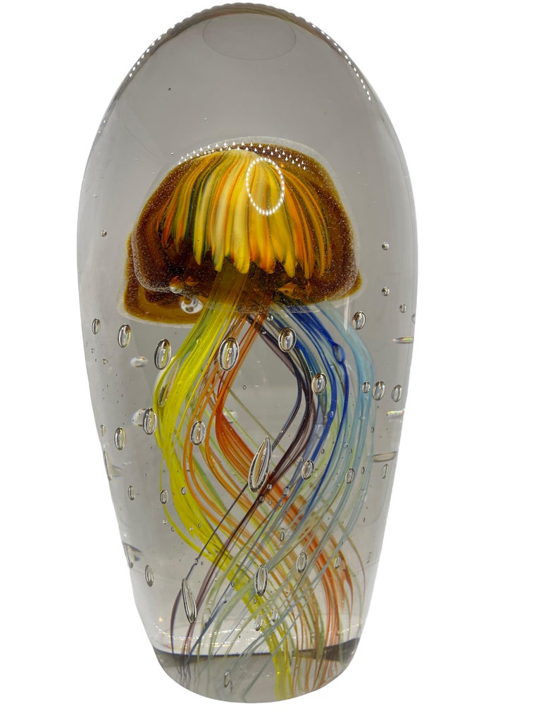 Beautiful stunning large Murano hand blown aquarium design Italian art glass sculpture. Showing two Jellyfish inside, in two different colors, floating on controlled bubbles. A beautiful nice addition at your table, credenza or side board.