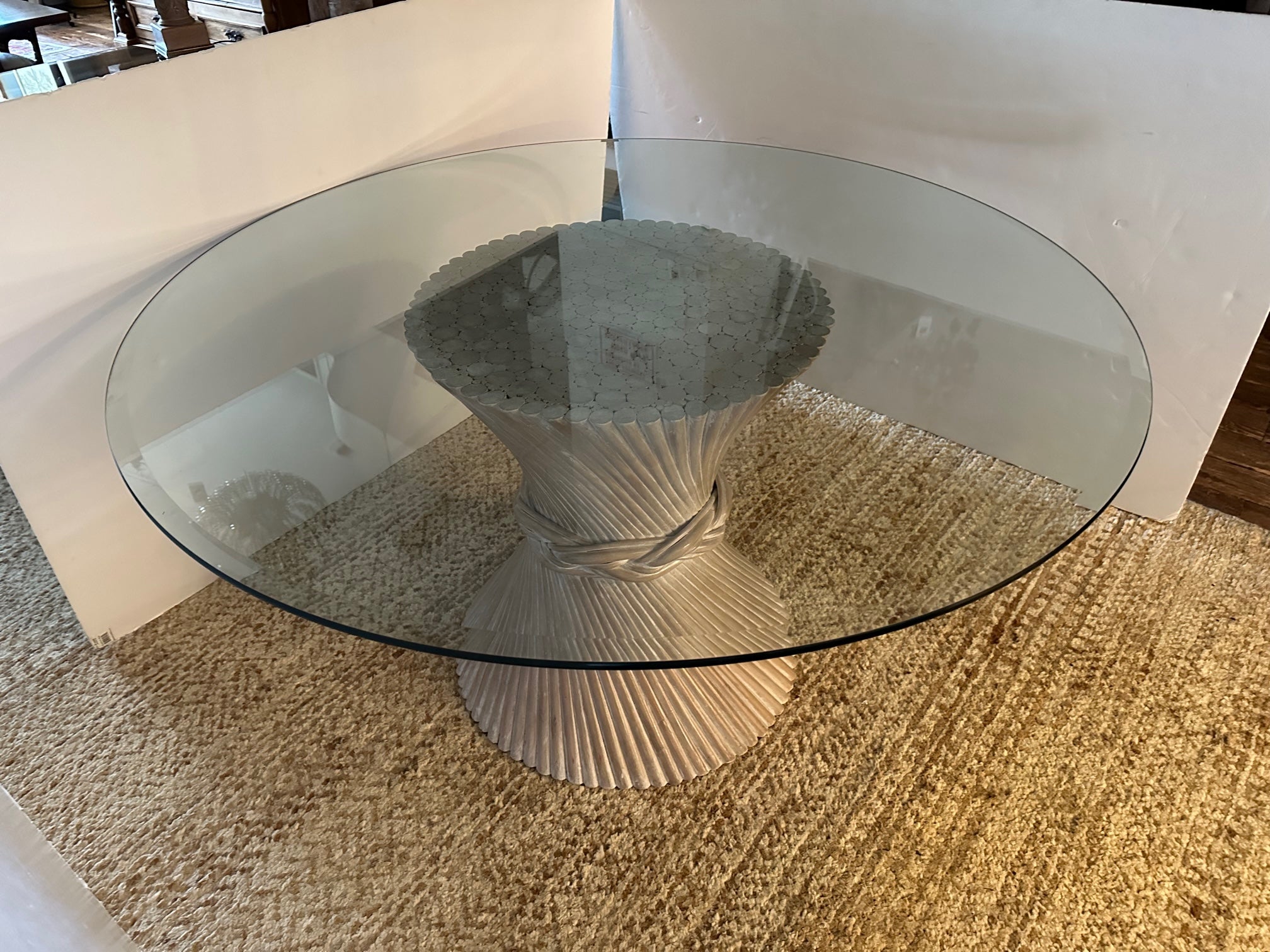 Vintage sheaf of wheat motif large table base by McGuire Furniture. The base is formed with a bundle of rattan reeds and woven band surrounding the center, painted a creamy white. Very heavy and sturdy. Comes with heavy round bevelled thick piece of