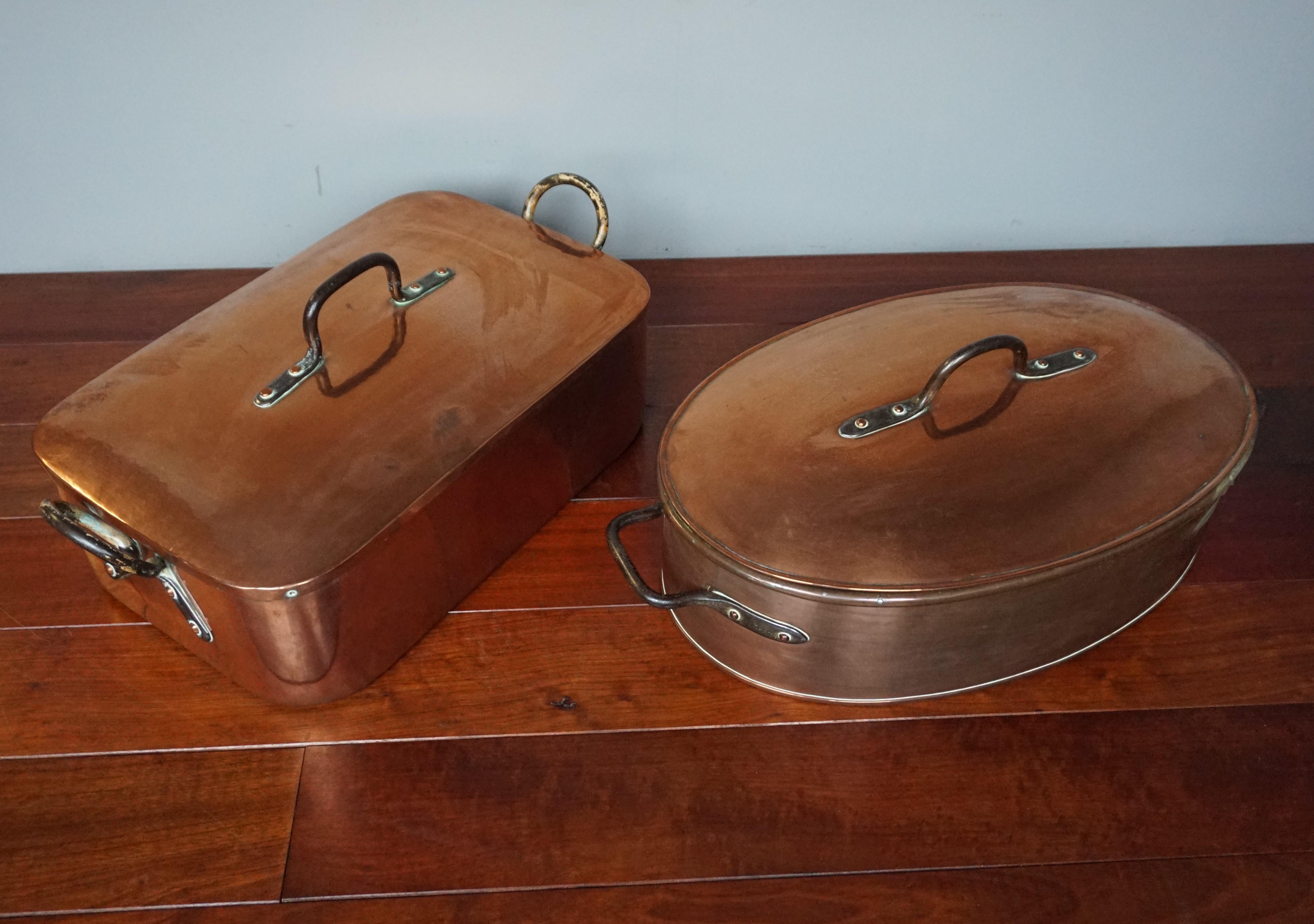 Extremely rare pair of top quality handcrafted, copper pans from the late 1700s or early 1800s.

These enormous and amazing antique pans are the largest we have ever seen and to have found a pair that have been together for at least 200 years was