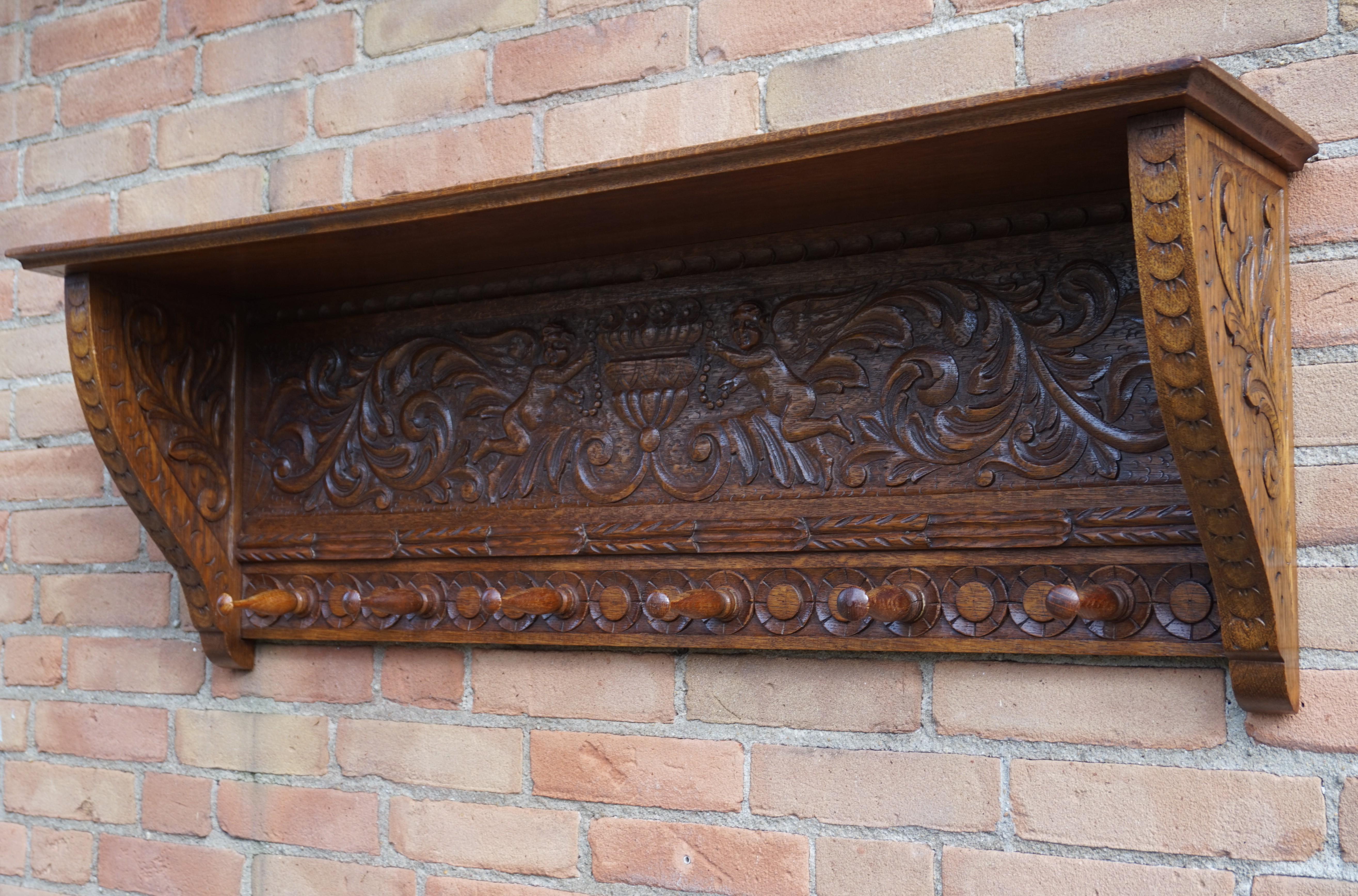 Beautiful and all hand carved antique wall coat rack, made of tiger oak.

This rare and perfectly handcrafted antique is in such amazing condition that we immediately knew we had to have it. The patina is second to none and this antique simply