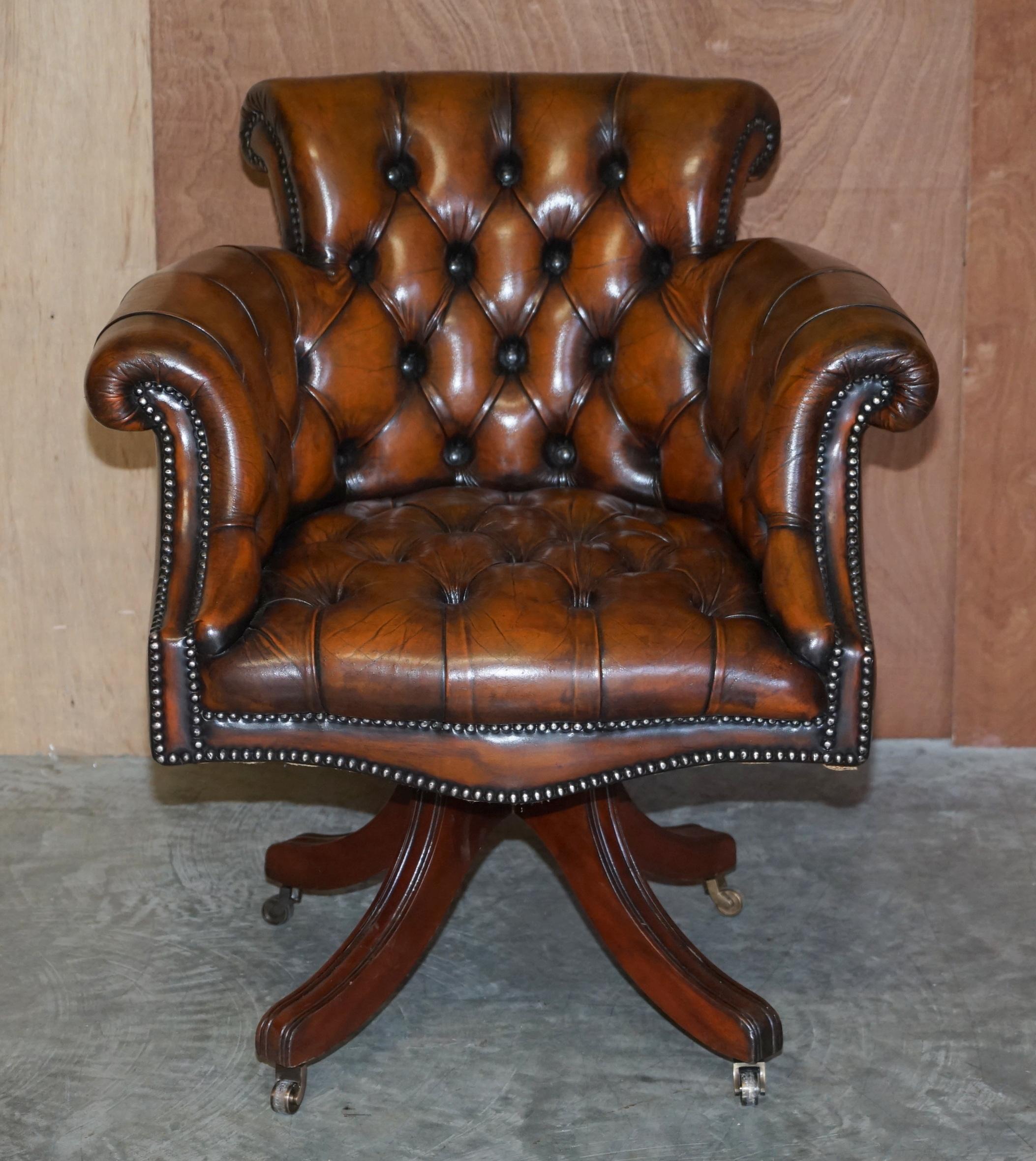 We are delighted to offer this very rare, fully restored, Victorian Chesterfield aged brown leather Directors armchair 

This is a very fine and well made English Directors chair, it has a coil sprung base, Chesterfield tufted all over and new