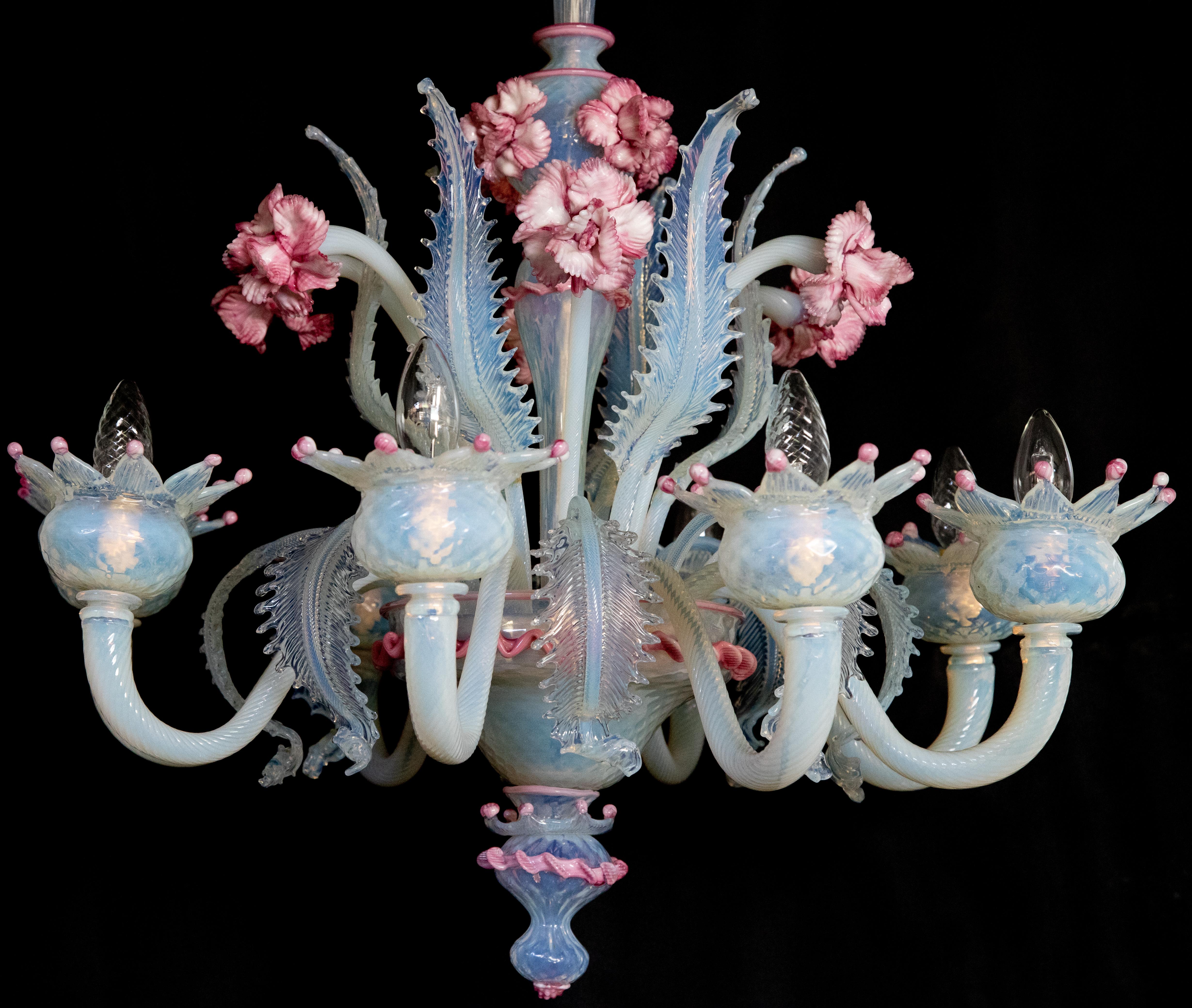 Murano chandelier of awesome beauty. Lights (8) flowers and leaves in pure Murano glass paste. Each piece is a jewel.