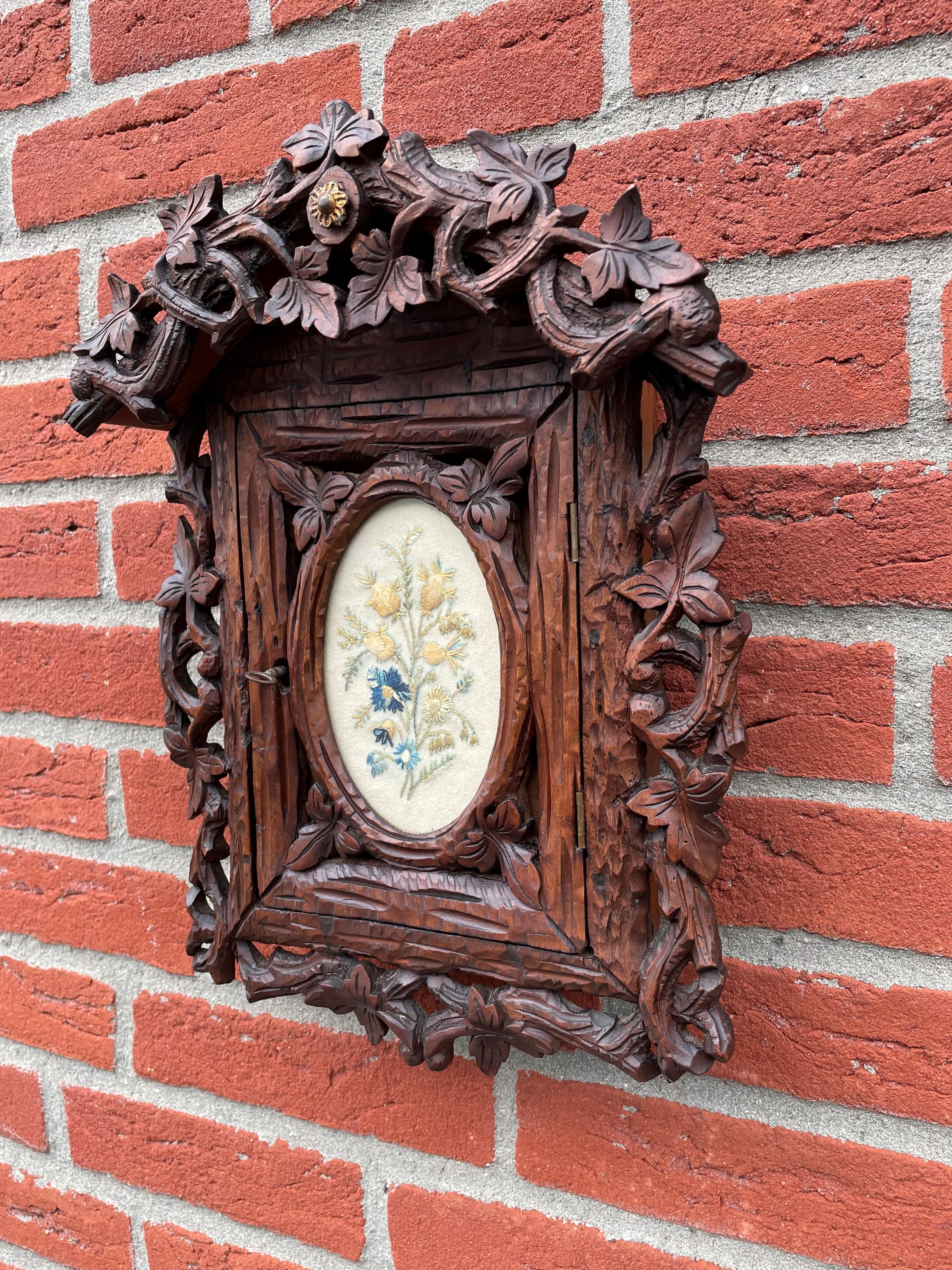 Hand-Carved Stunning Little Black Forest Wall Keys Cabinet w. Oval Glass and Needlework