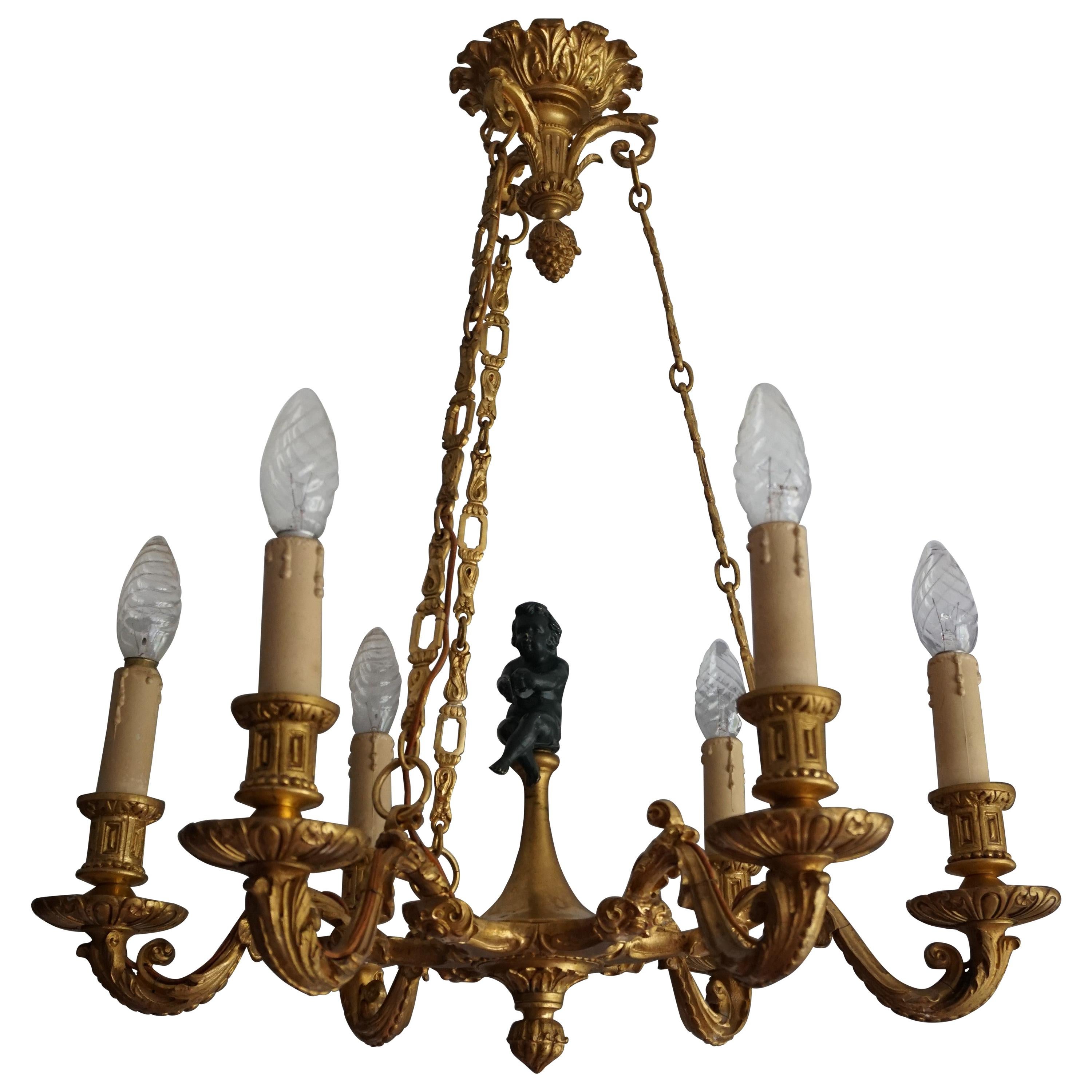 Stunning Little Gilt Bronze Chandelier with Scrolling Leafs and Putto Sculpture For Sale