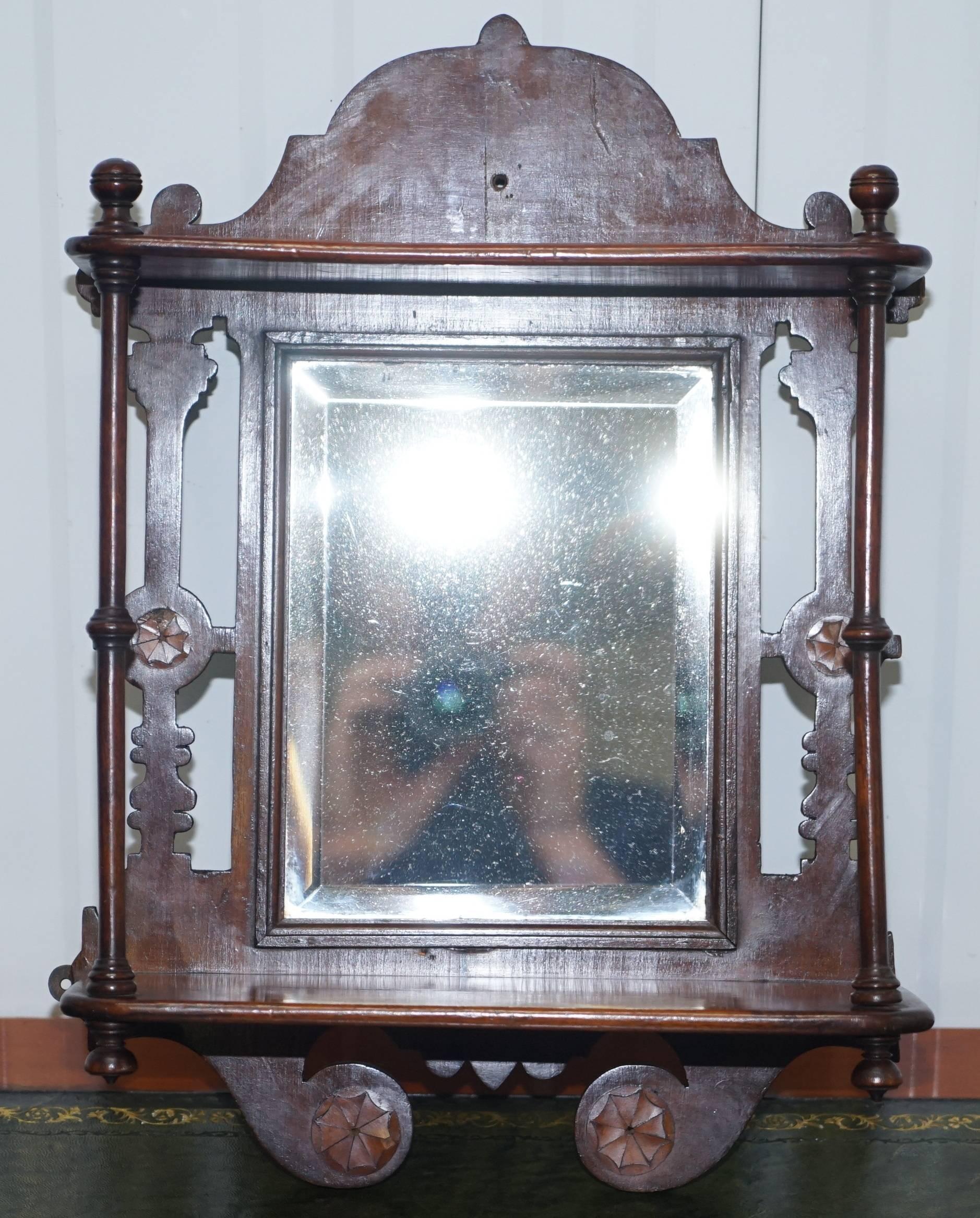 We are delighted to offer for sale this lovely little mahogany shaving mirror with original tapered plate glass.

A very good looking little wall-mounted mirror, you don’t need to use it for shaving of course, it can be anywhere, ideal for a