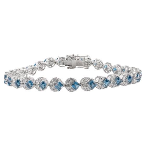 Superbe bracelet tennis londonien en argent sterling avec topaze bleue et diamants