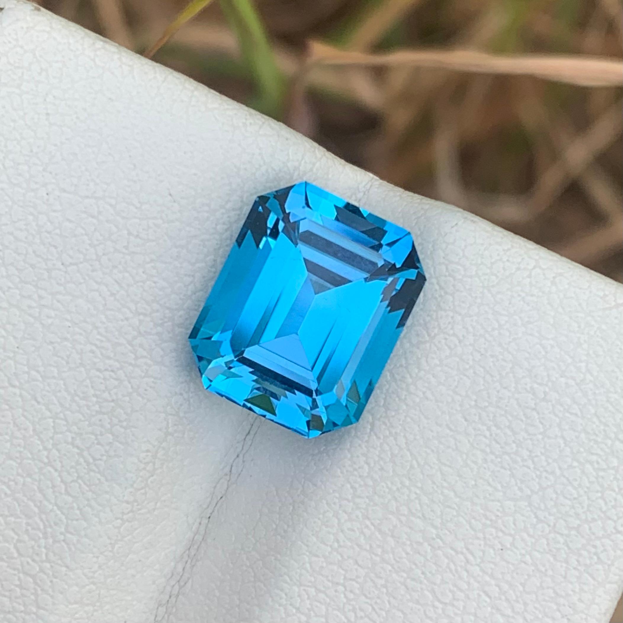 Loose Blue Topaz
Weight: 7.45 Carats 
Dimension: 11.5x9.5x7.3 Mm
Origin: Brazil
Shape: Emerald 
Color: Blue
Treatment: Non
Certificate: On Client Demand 
Electric blue topaz is a striking and vibrant gemstone celebrated for its vivid blue color and