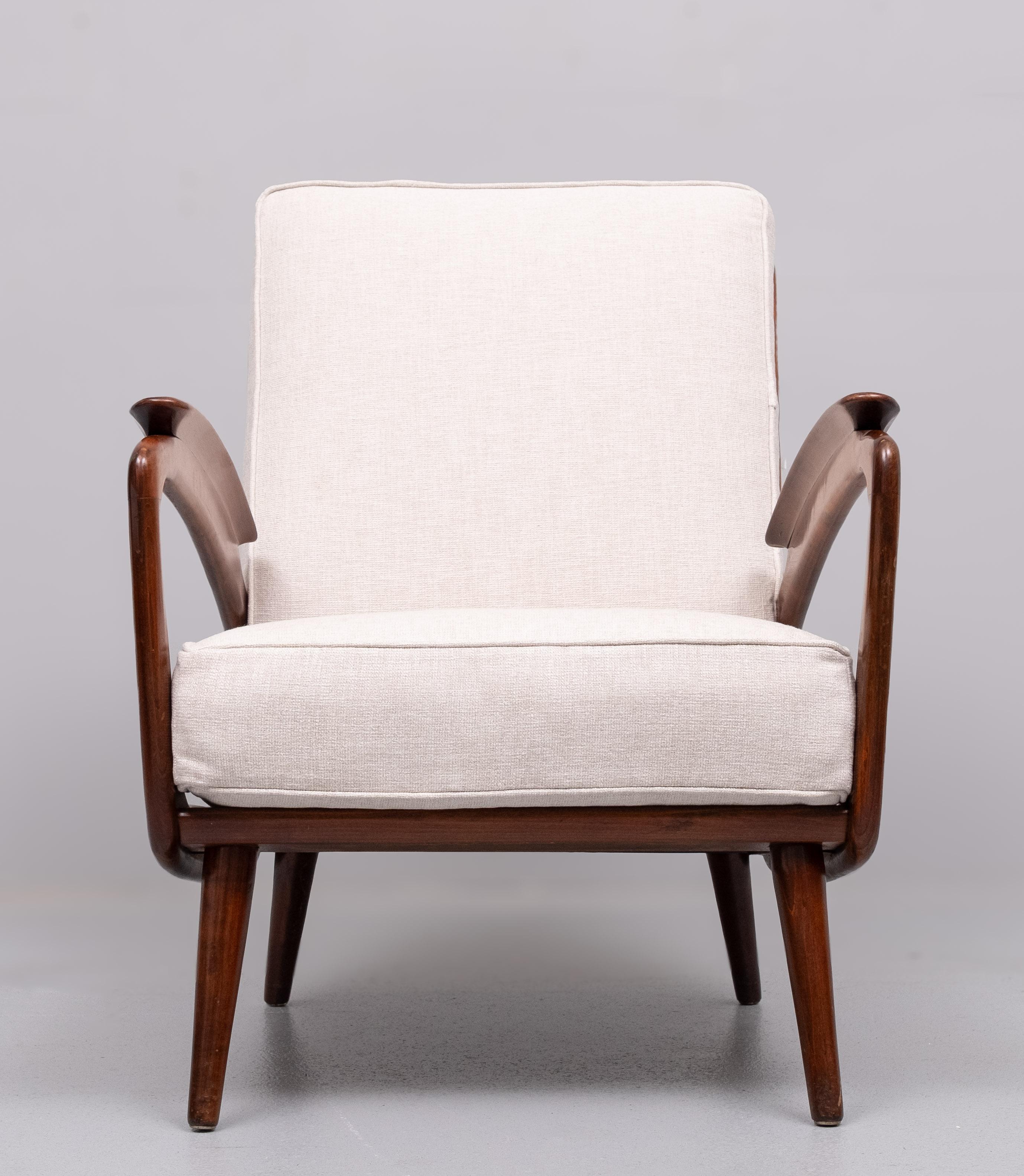 Superb Color and design ,Manufactured by De Ster Gelderland, Holland
Sculptural armrests in boat shape, tension spring seat and back .
original metal spring interior cushions . Brand new Linen upholstery .
Very good seating comfort . Great looking