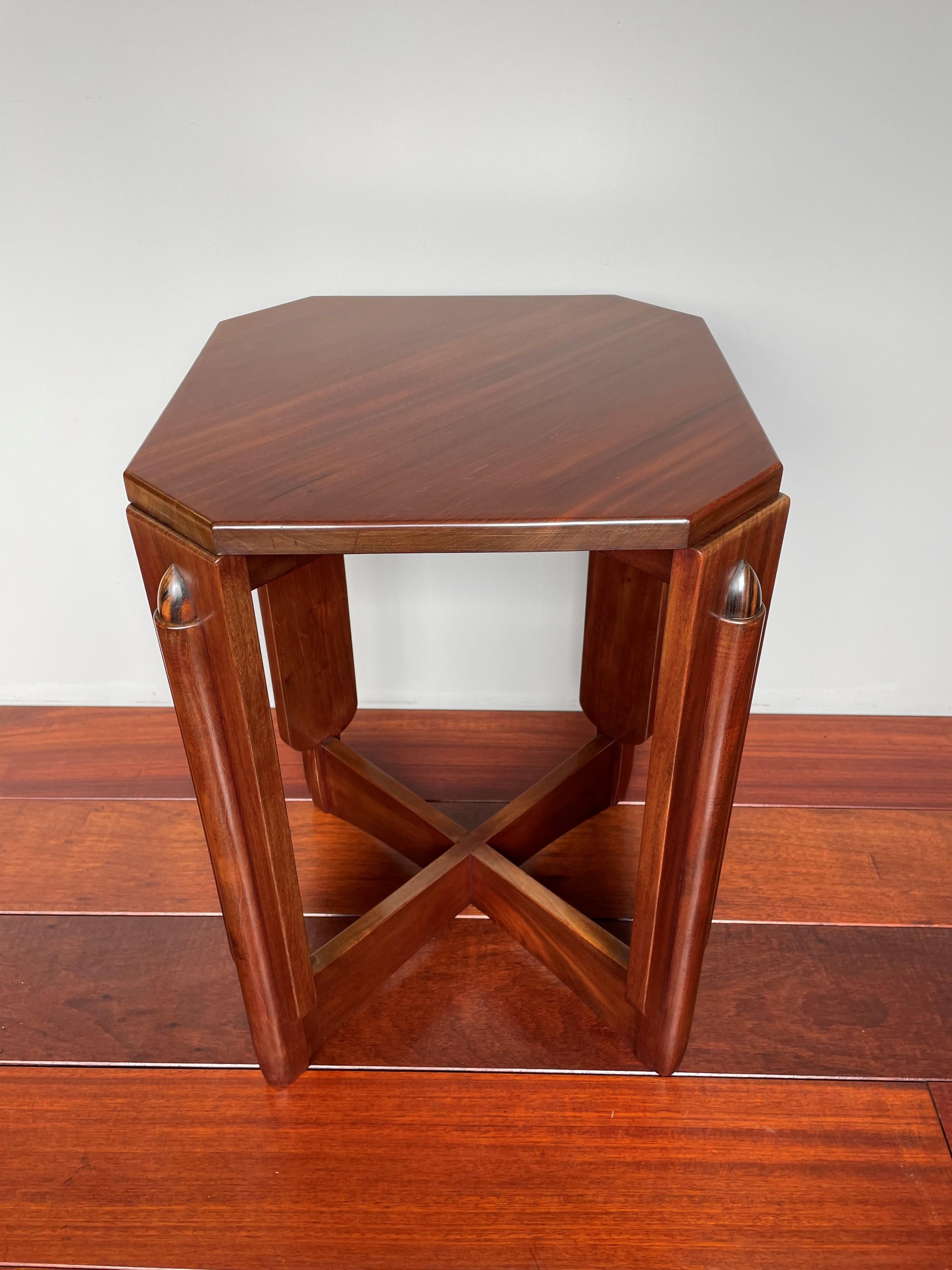 Early 20th century, multipurpose, Arts and Crafts table from Amsterdam.

In the early 1900s there were only very few designers in Amsterdam who were capable of creating these stunning, geometric and timeless designs. This almost entirely made of