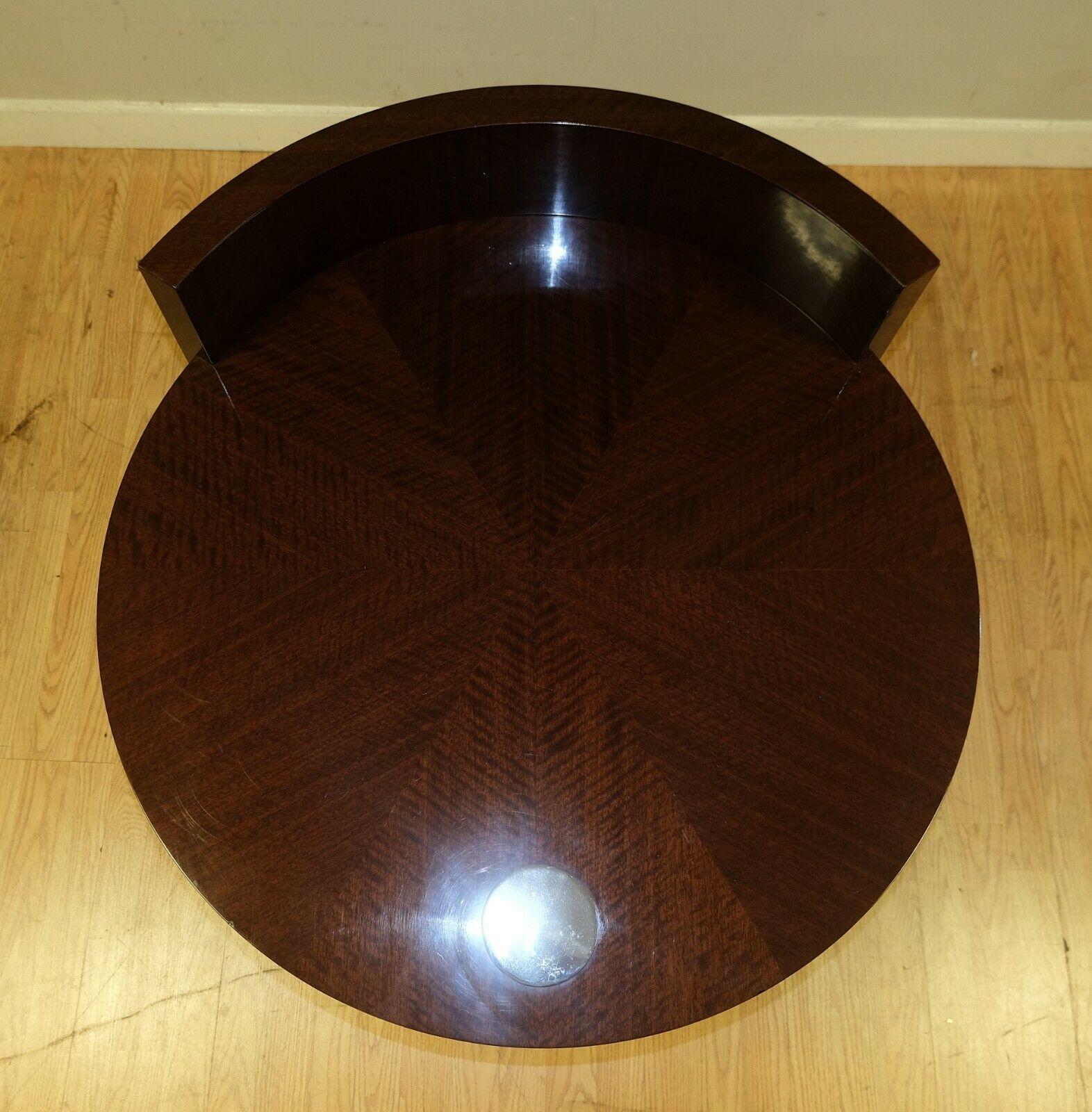 We are delighted to offer for sale this elegant brown Mahogany Drum side/wine table with two tier.

The look of this unique design is eye catching, showing style and elegance. The item is sturdy, very well made which comes along with a wonderful,