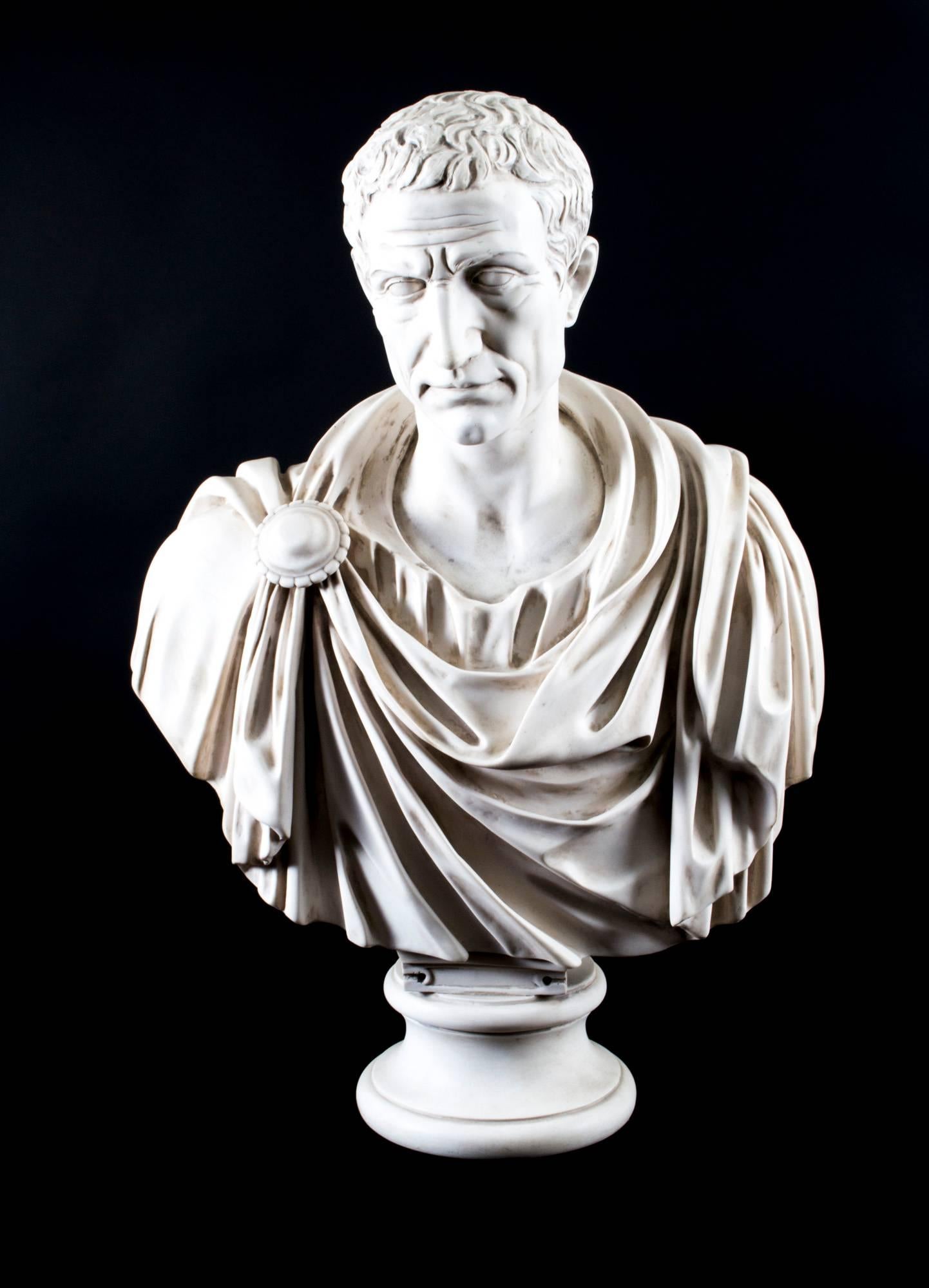 A beautifully sculpted marble bust of the famous Roman general Lucius Junius Brutus dating from the last quarter of the 20th century.

He is wearing a flowing toga with a fibulae or broach holding it in place, on a matching elegant pedestal in the