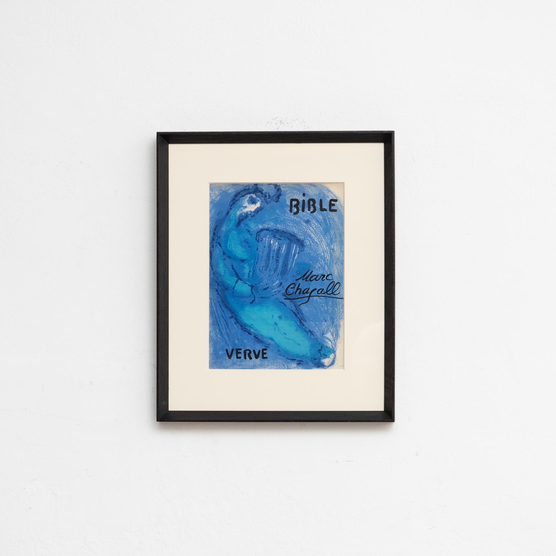 Impresionante litografía en tonos azules de Marc Chagall, enmarcada, 1956 para Verve 

Descubre la elegancia intemporal de la litografía de Marc Chagall en tonos azules, una obra maestra de 1956, impresa por Mourlot en Francia. Esta exquisita pieza