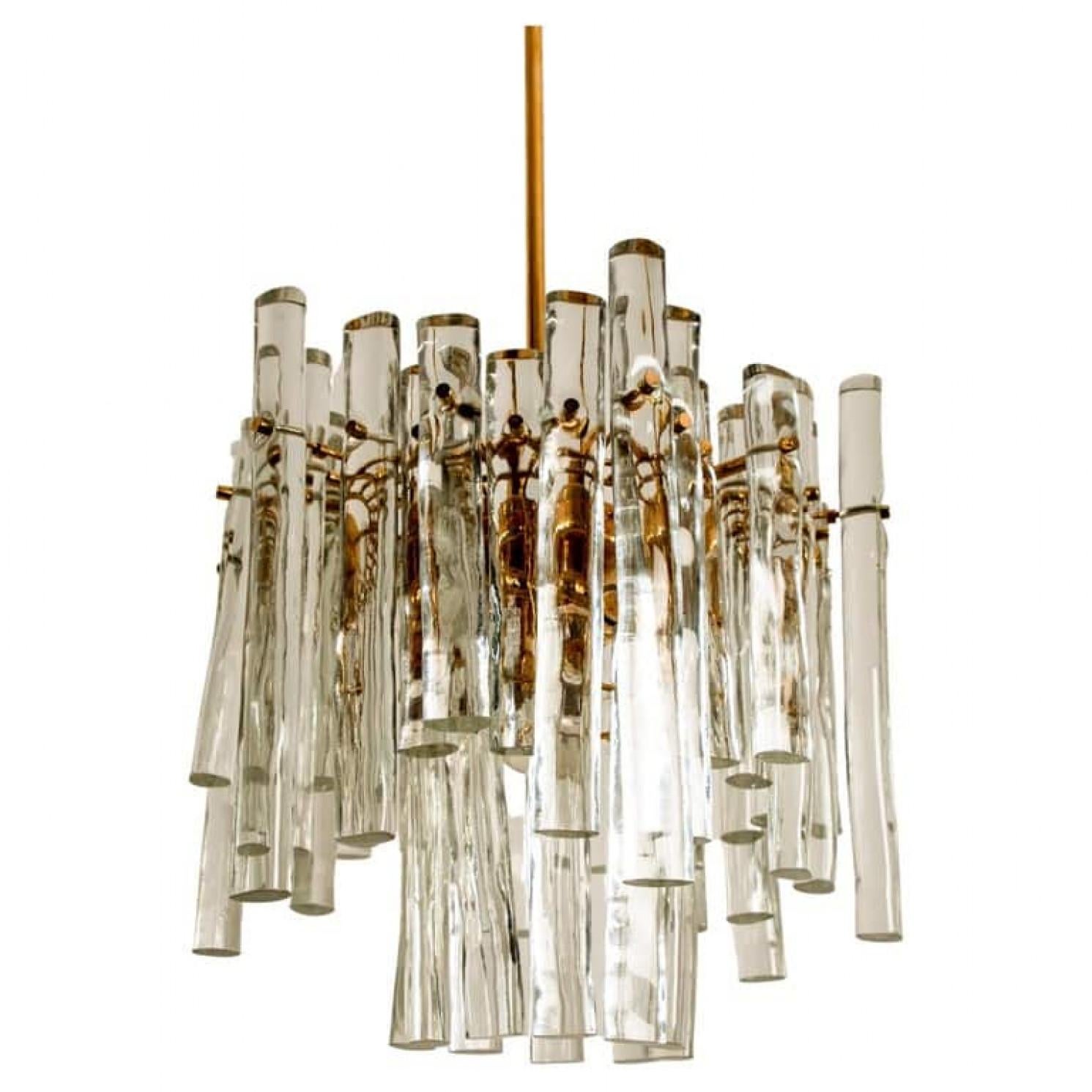 This modernist design chandelier was designed by the Kinkeldey design team during the 1970s, and manufactured in Germany by Kinkeldey. The frame is also stamped with the Kinkeldey manufacturer's mark. A very elegant and fine chandelier, it is