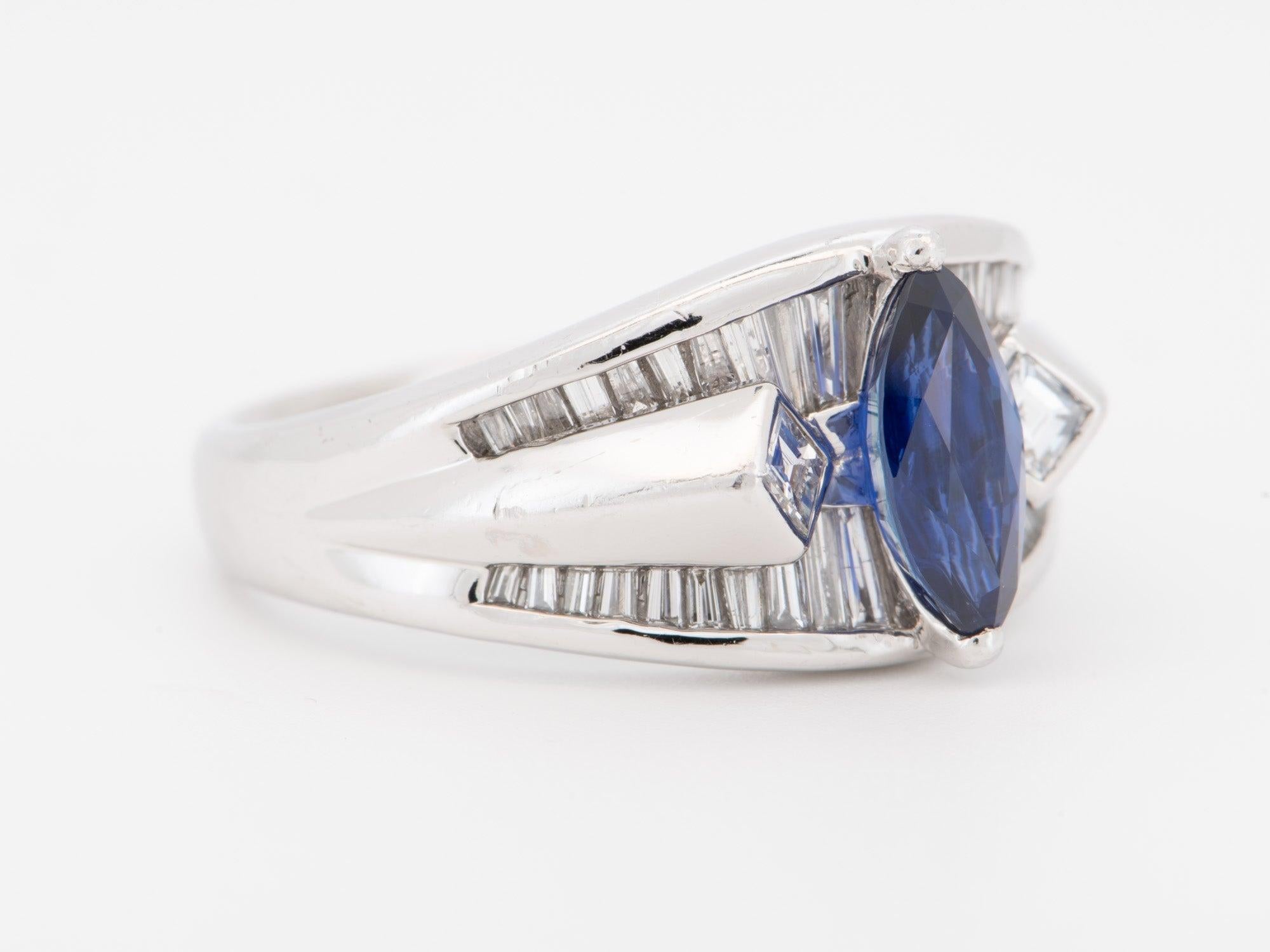 ♥ Stunning Marquise Sapphire with Baguette Diamond Engagement Ring PT900 Heavy 12g v1164
♥ This item measures 11.4mm in length (North South direction), 21mm in width (East West direction), and sits 6mm tall from the finger. Band width is 3.6mm.
♥
