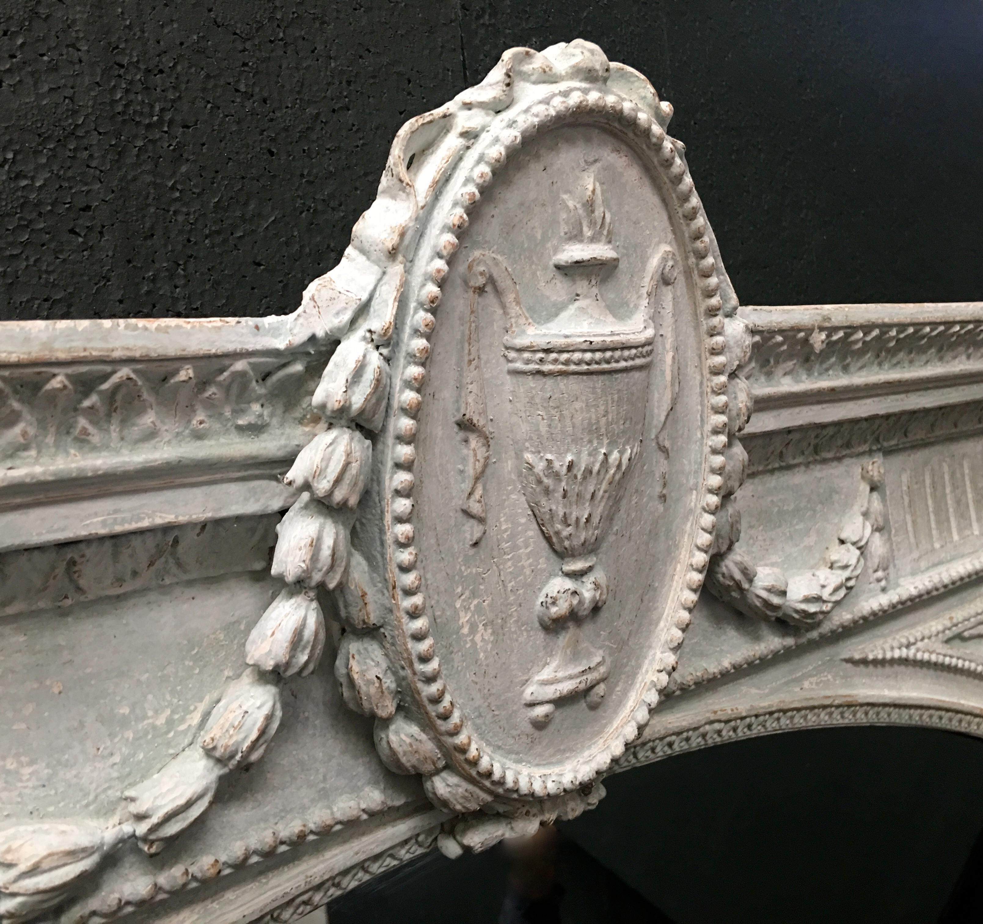This mirror was sourced from a large 19th century beachfront residence in the south of England. When purchased, the mirror was covered in white household gloss paint. Our restoration team have carefully dry scraped off these layers to reveal a