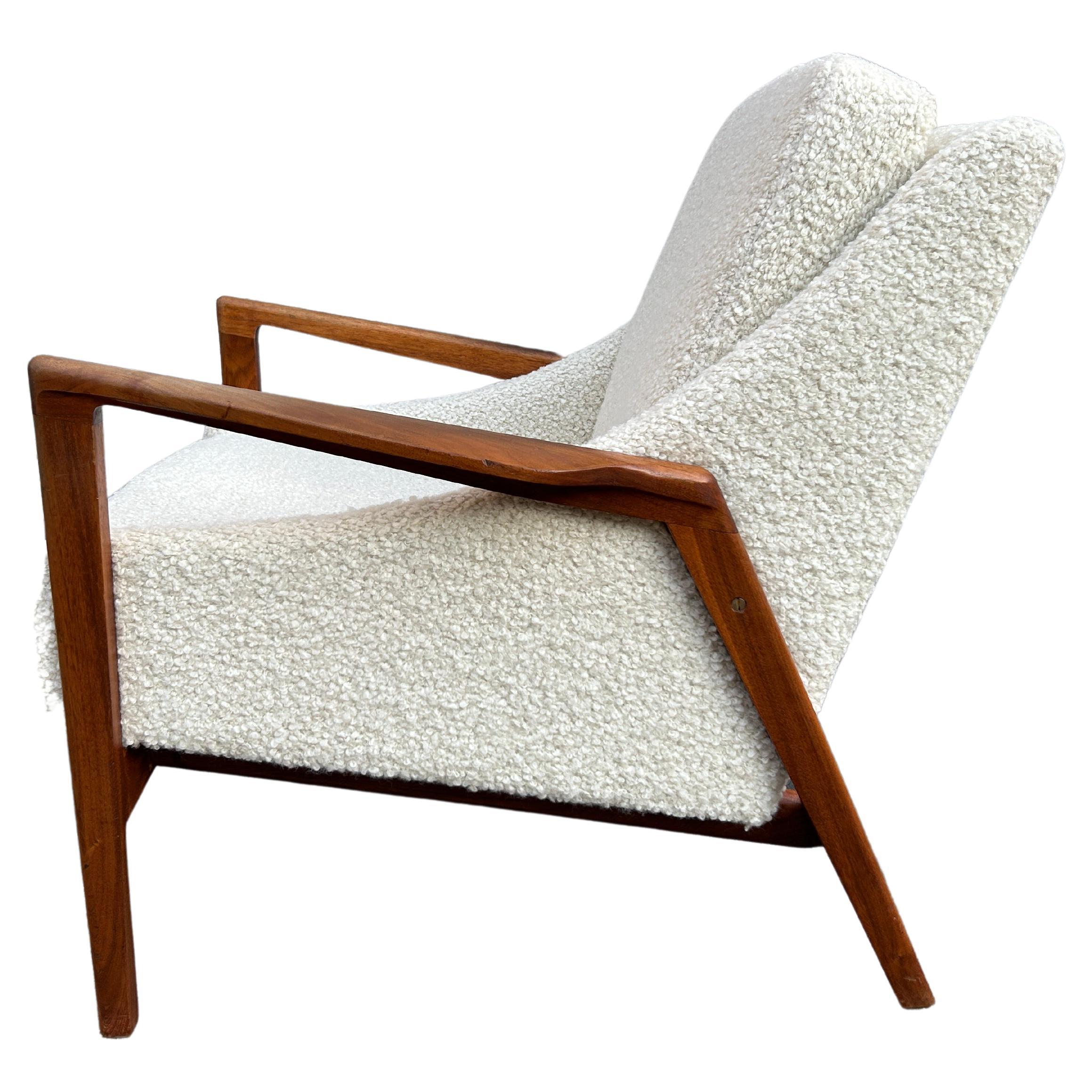 Mid Century Danish modern lounge chair in Boucle with wood frame. Beautiful designed Danish Lounge chair fully restored. In the manner of Ib Kofod Larsen. This chair was fully reupholstered with Holly Hunt Alpaca Boucle - Teddy bear. The wood frame