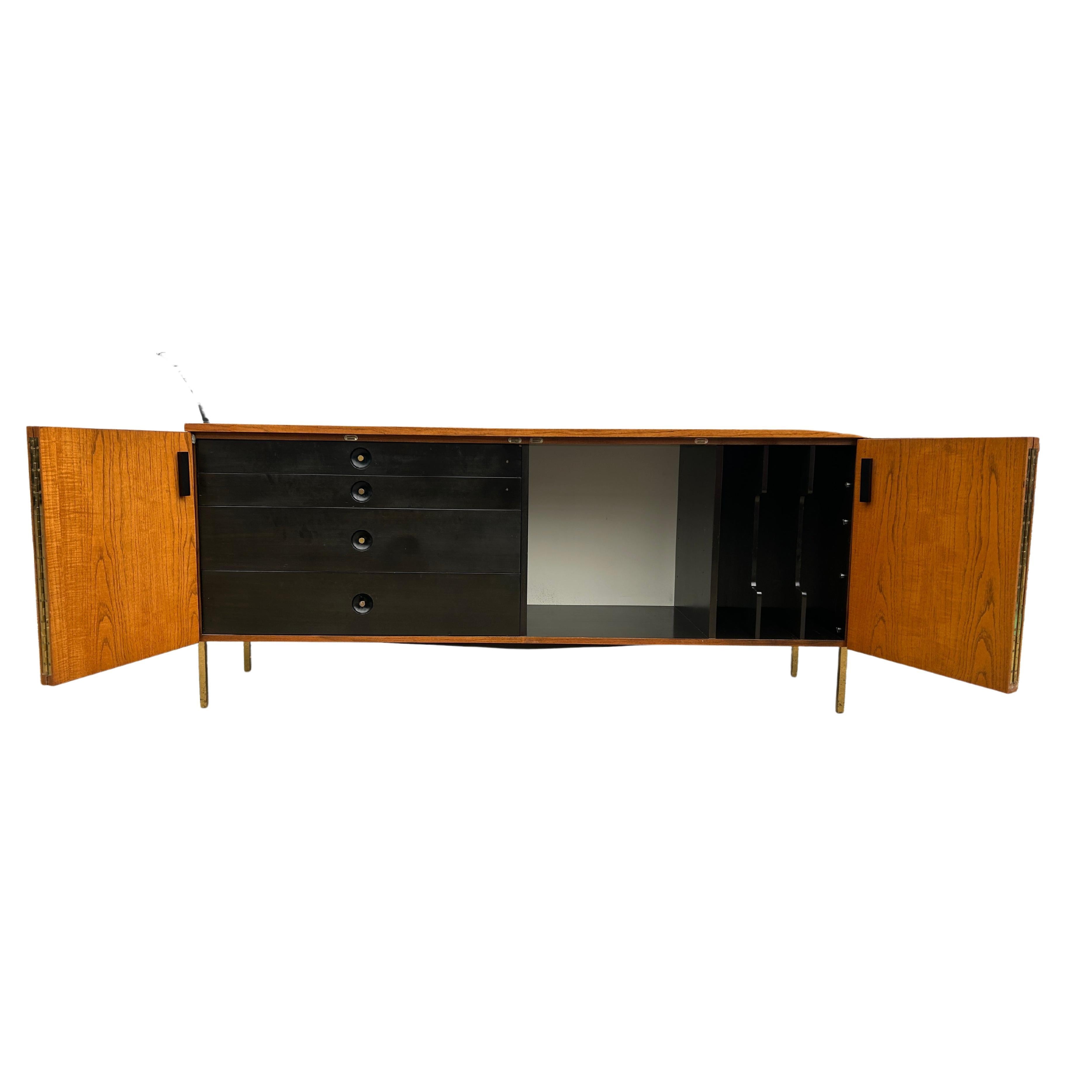 Incredibly crafted Harvey Probber Stunning Midcentury credenza, sideboard or audio cabinet. Retains the metal tag inside top drawer. Beautiful bleached walnut wood with 4 ebonized interior drawers, 1 adjustable shelf and vertical slots. Top drawer