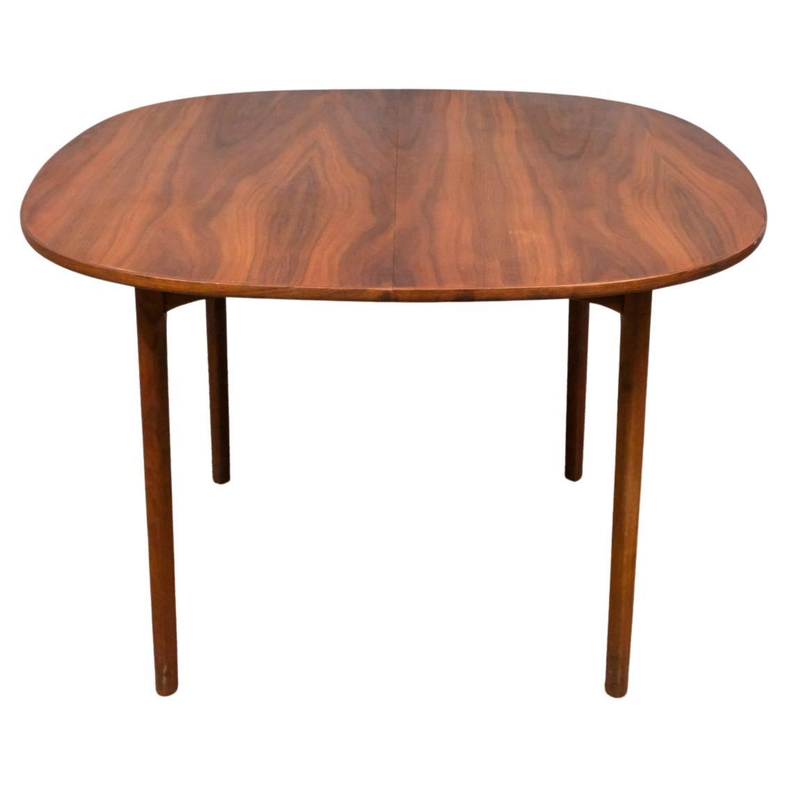 Danish Stunning Mid century modern danish teak rounded dining table with two leaves For Sale
